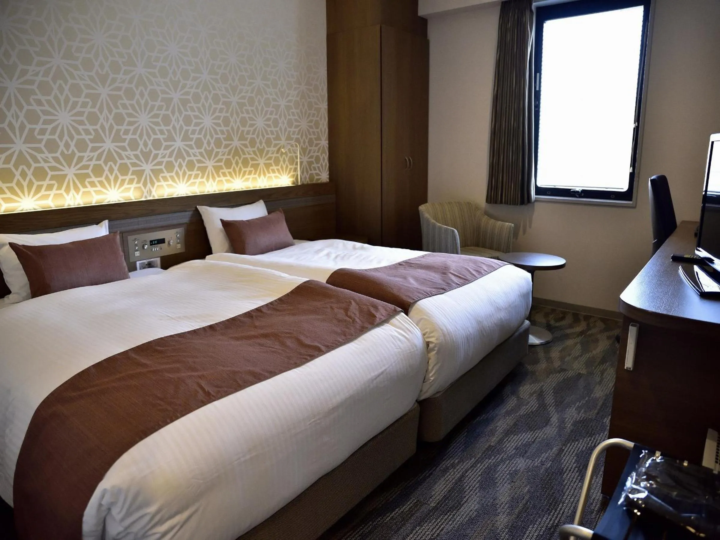 Bed in Hotel Fukuoka Garden Palace