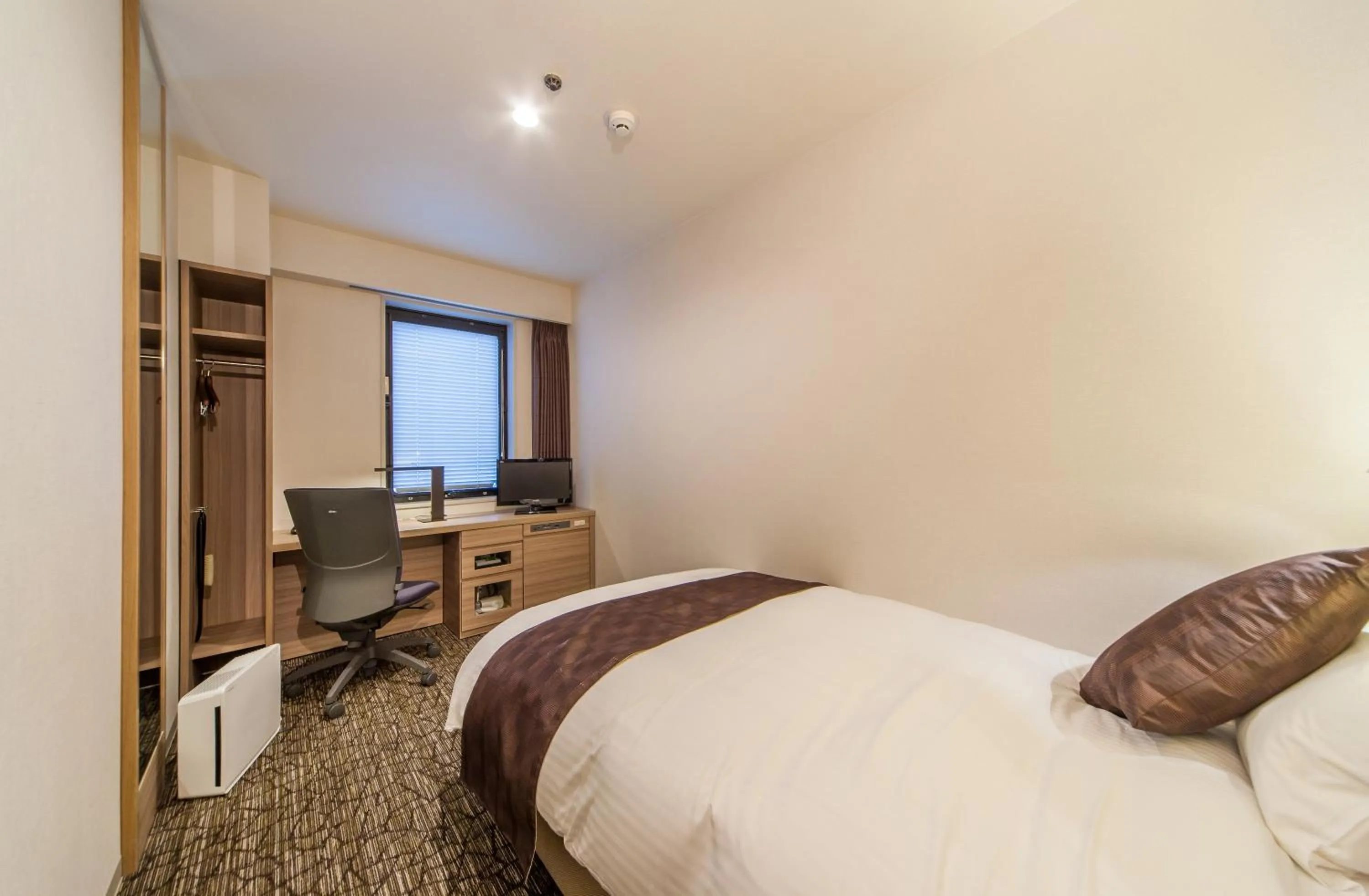 Bed in Hotel Fukuoka Garden Palace