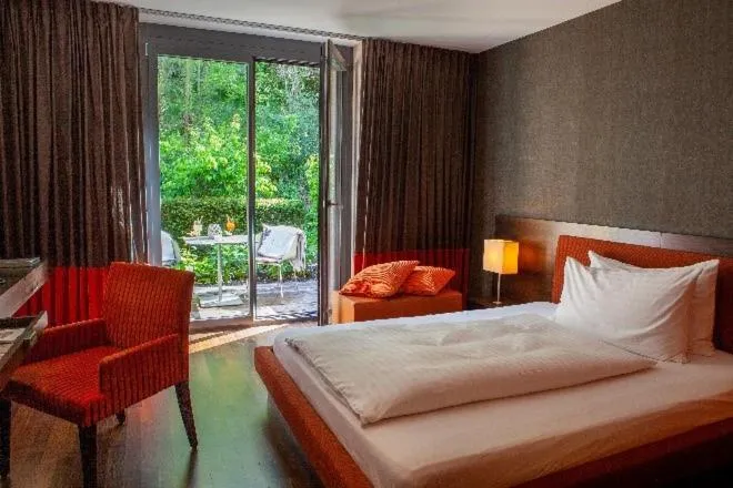 Bed in Bad Bubendorf Design & Lifestyle Hotel