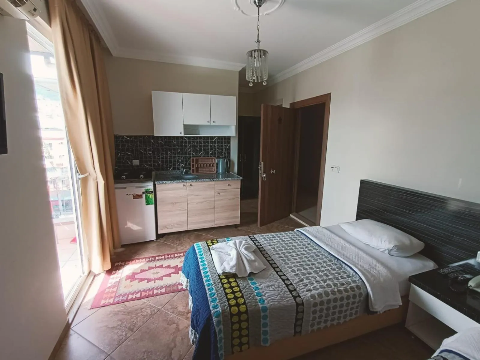 Photo of the whole room, Bed in Le Moral Apart Hotel