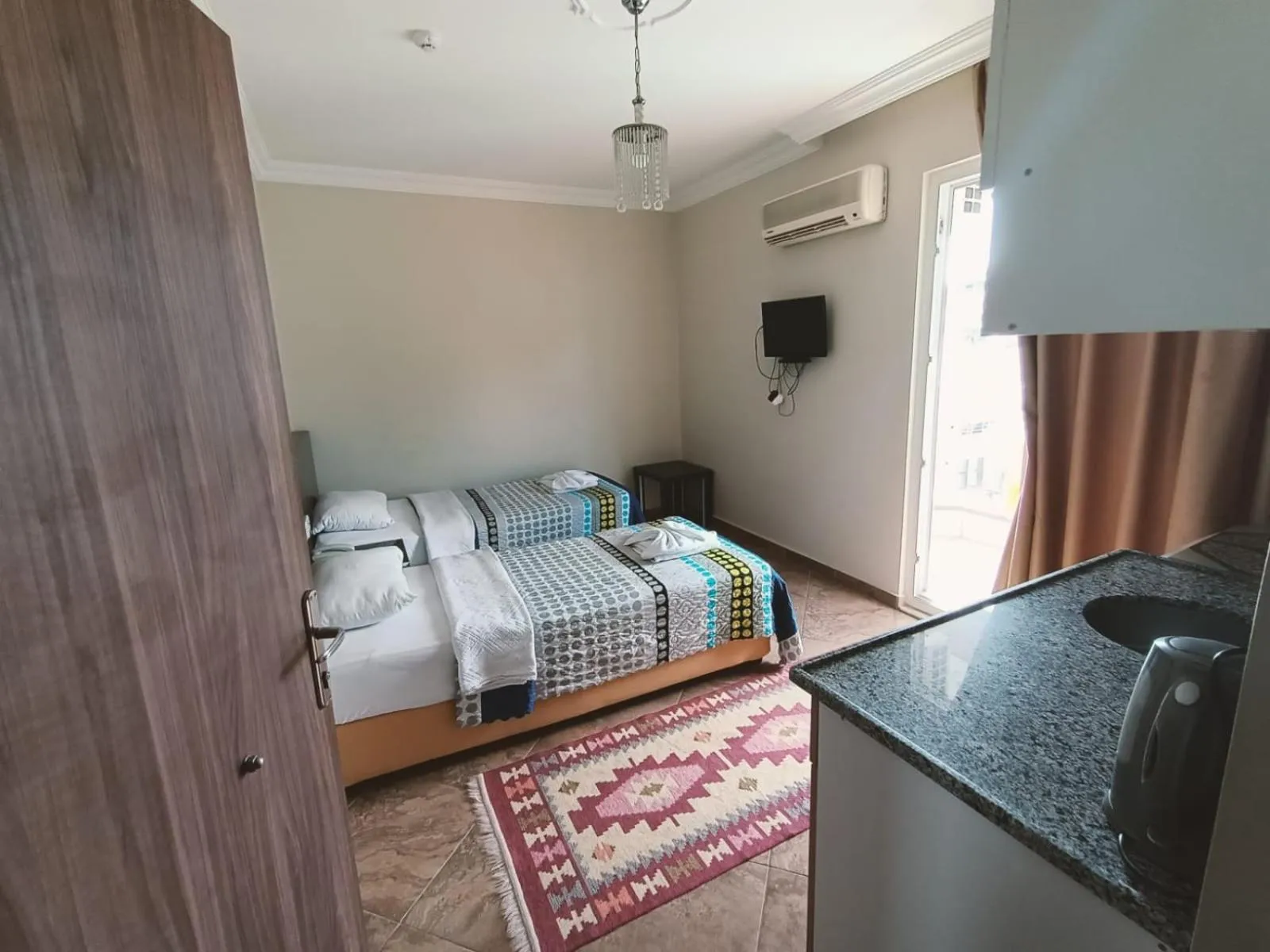 Photo of the whole room, Bed in Le Moral Apart Hotel