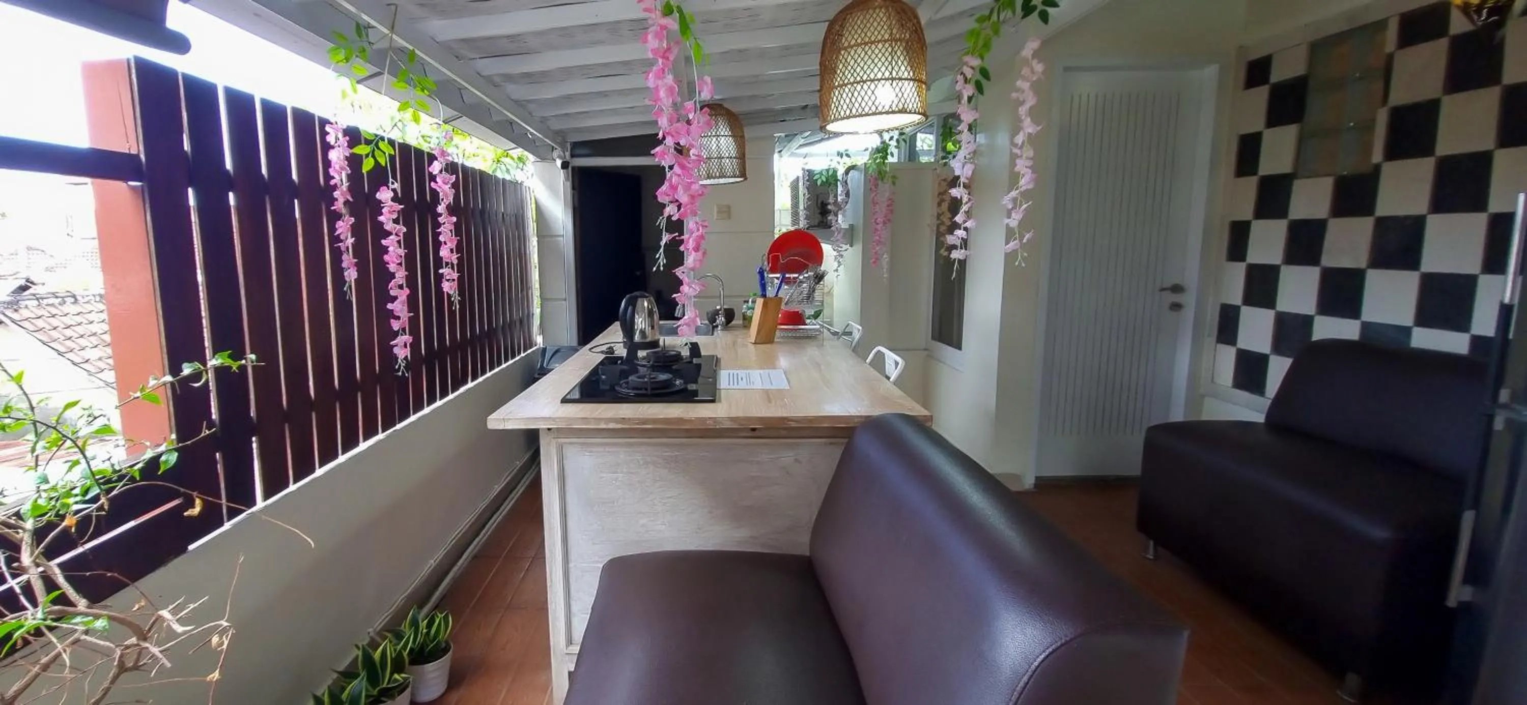 Kitchen or kitchenette in Gustav Bali Homestay and Massage