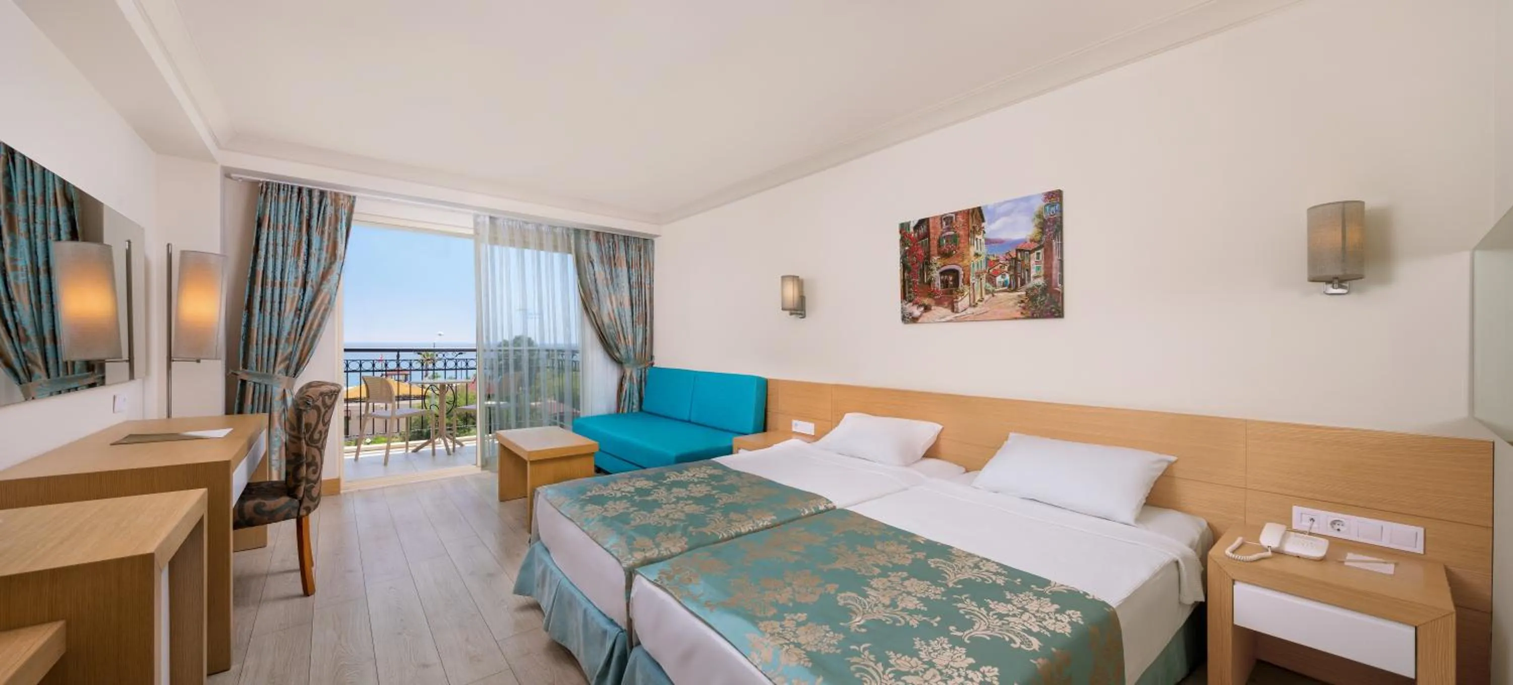 Photo of the whole room, Bed in L'Oceanica Beach Resort