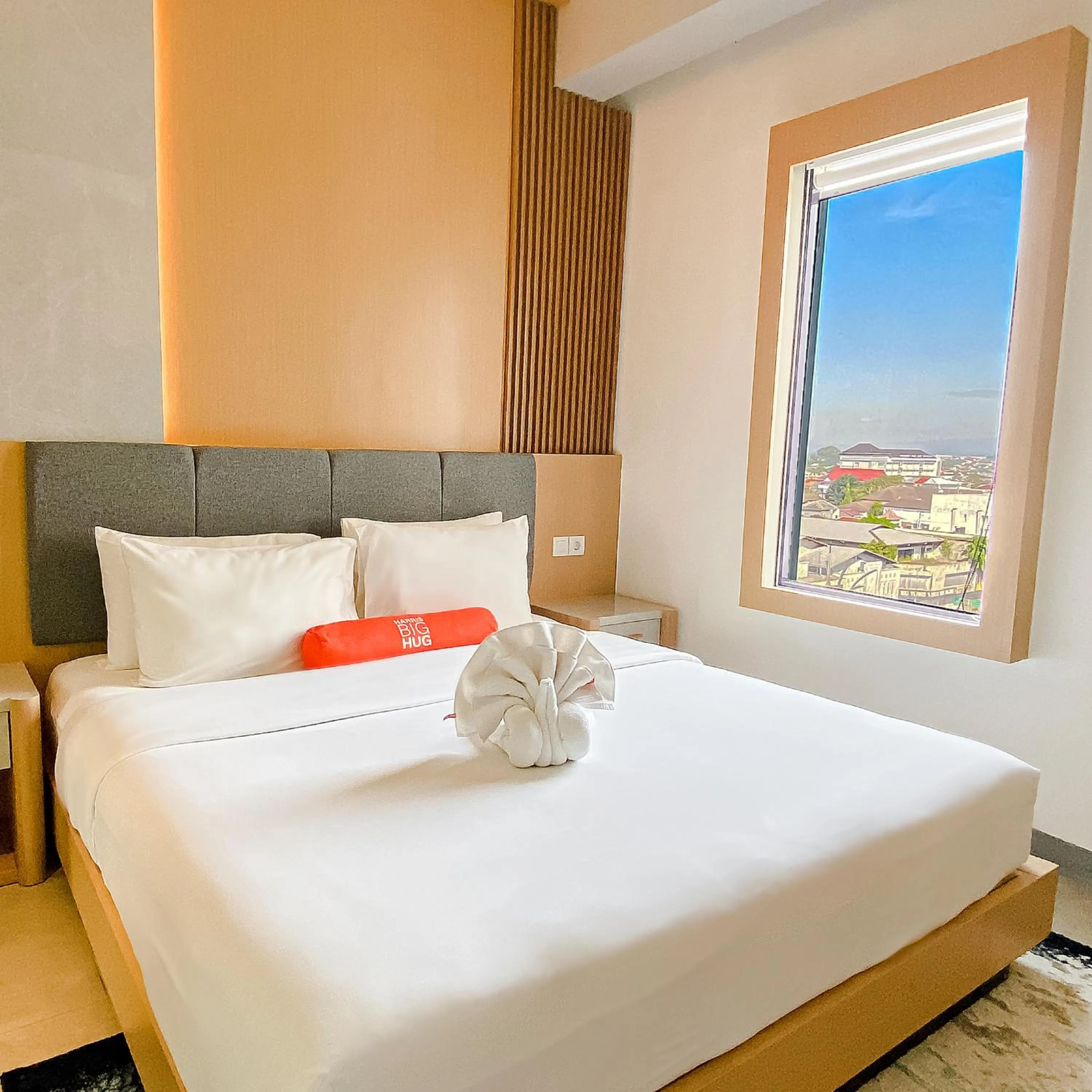 Bed in HARRIS Hotel & Conventions Solo