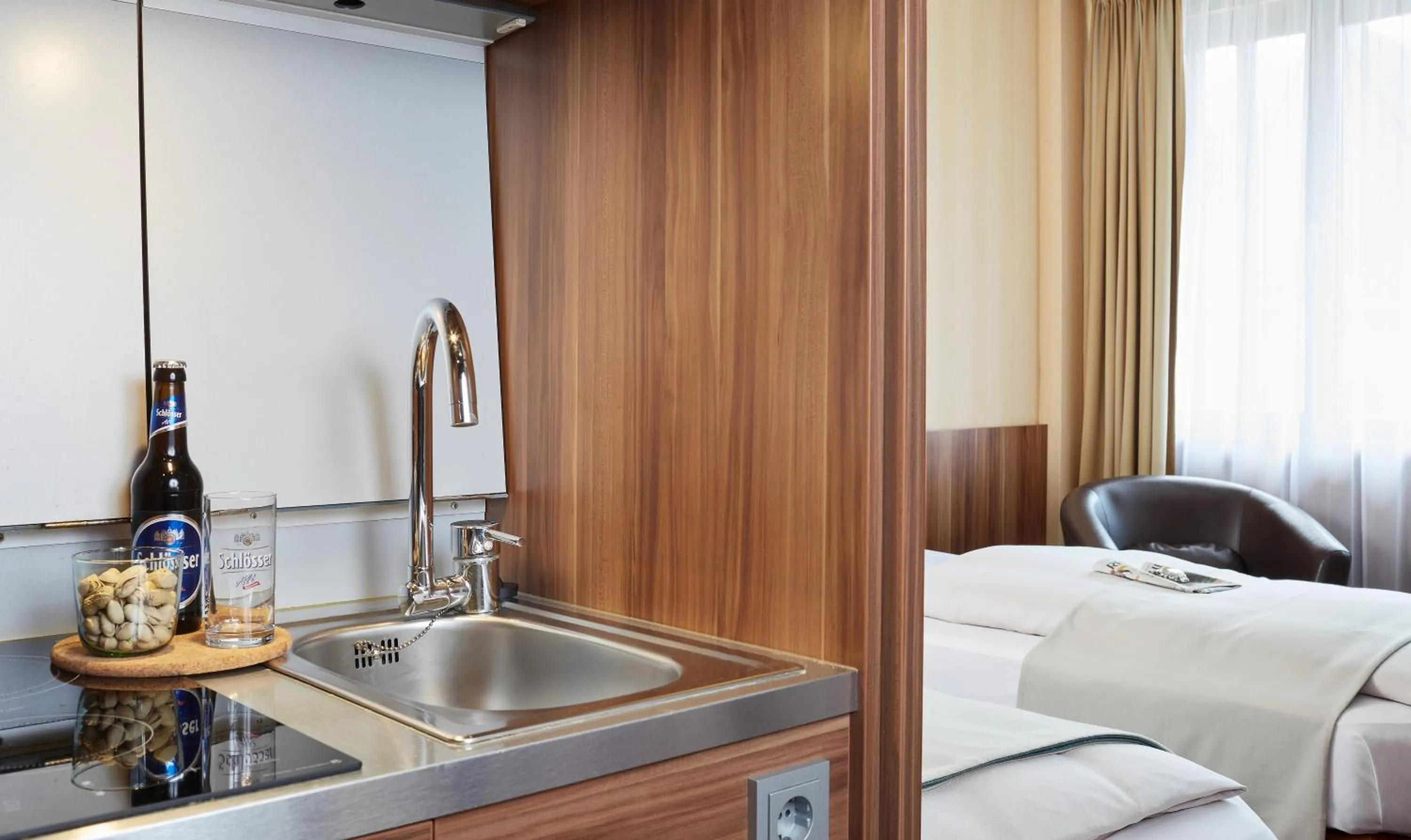 Photo of the whole room, Bed in Living Hotel Düsseldorf