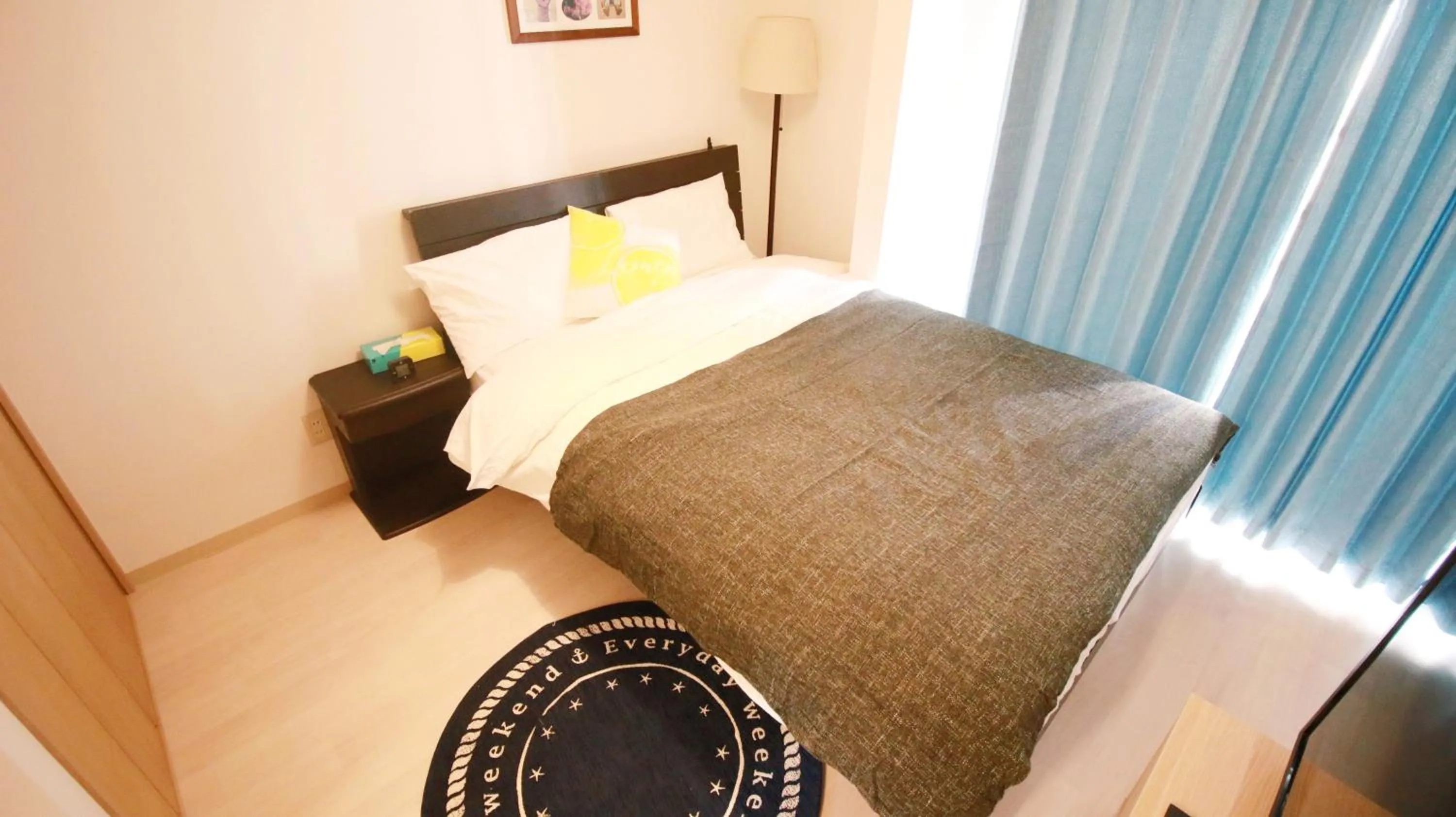 Bed in Uhome Kanda Hotel