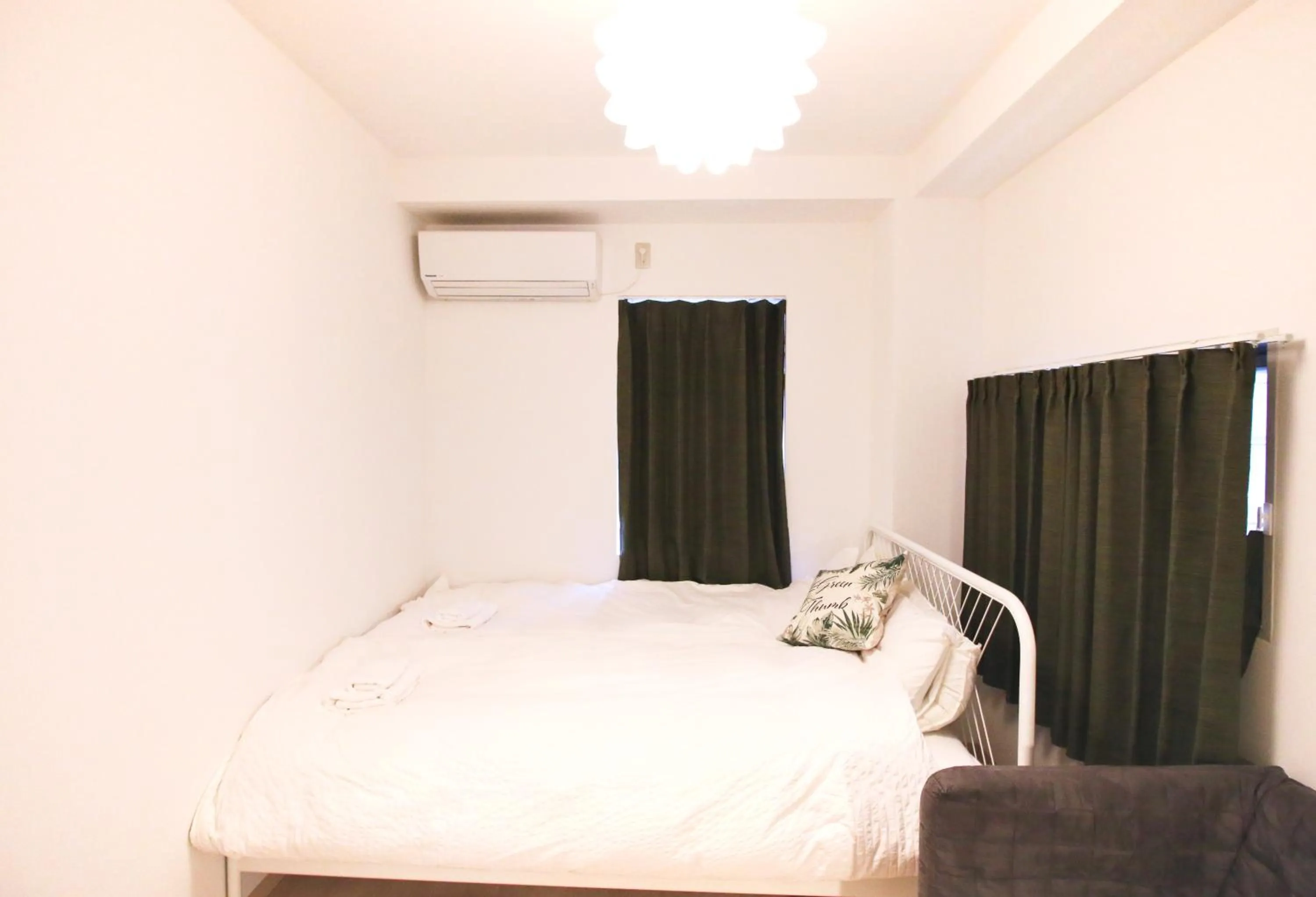 Bed in Uhome Kanda Hotel