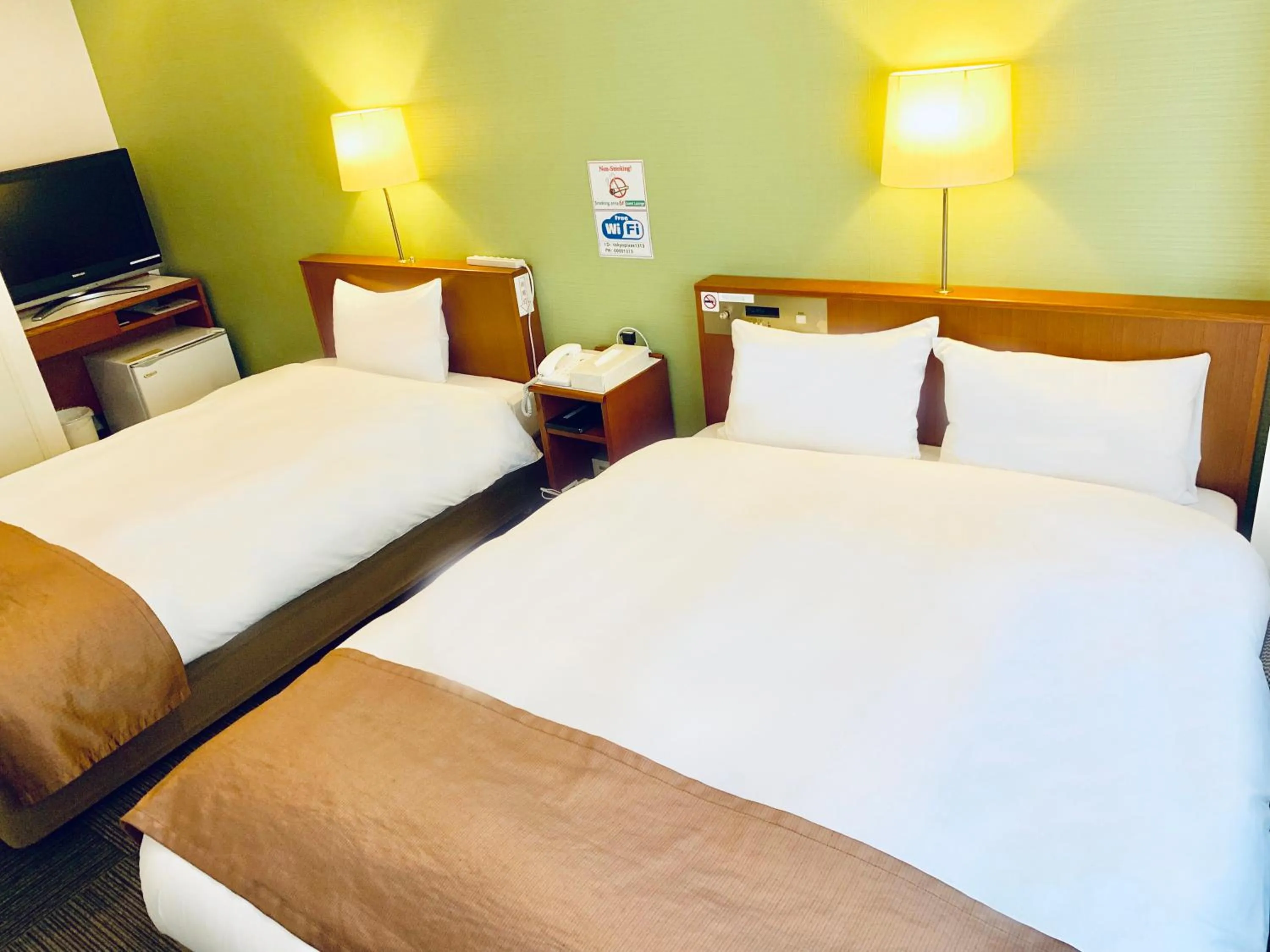 Bed in Tokyo Plaza Hotel