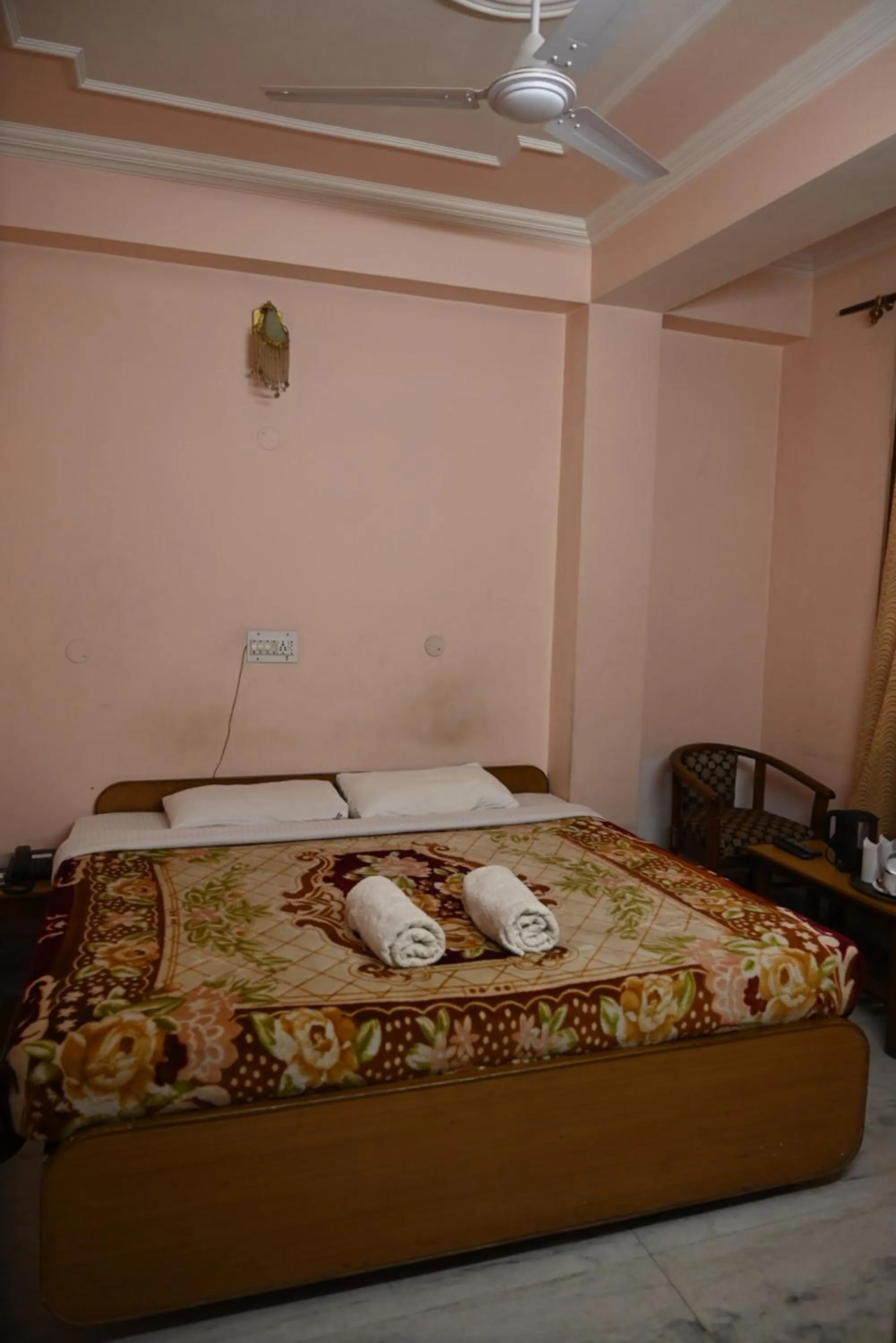 Bed in Hotel Atul Regency