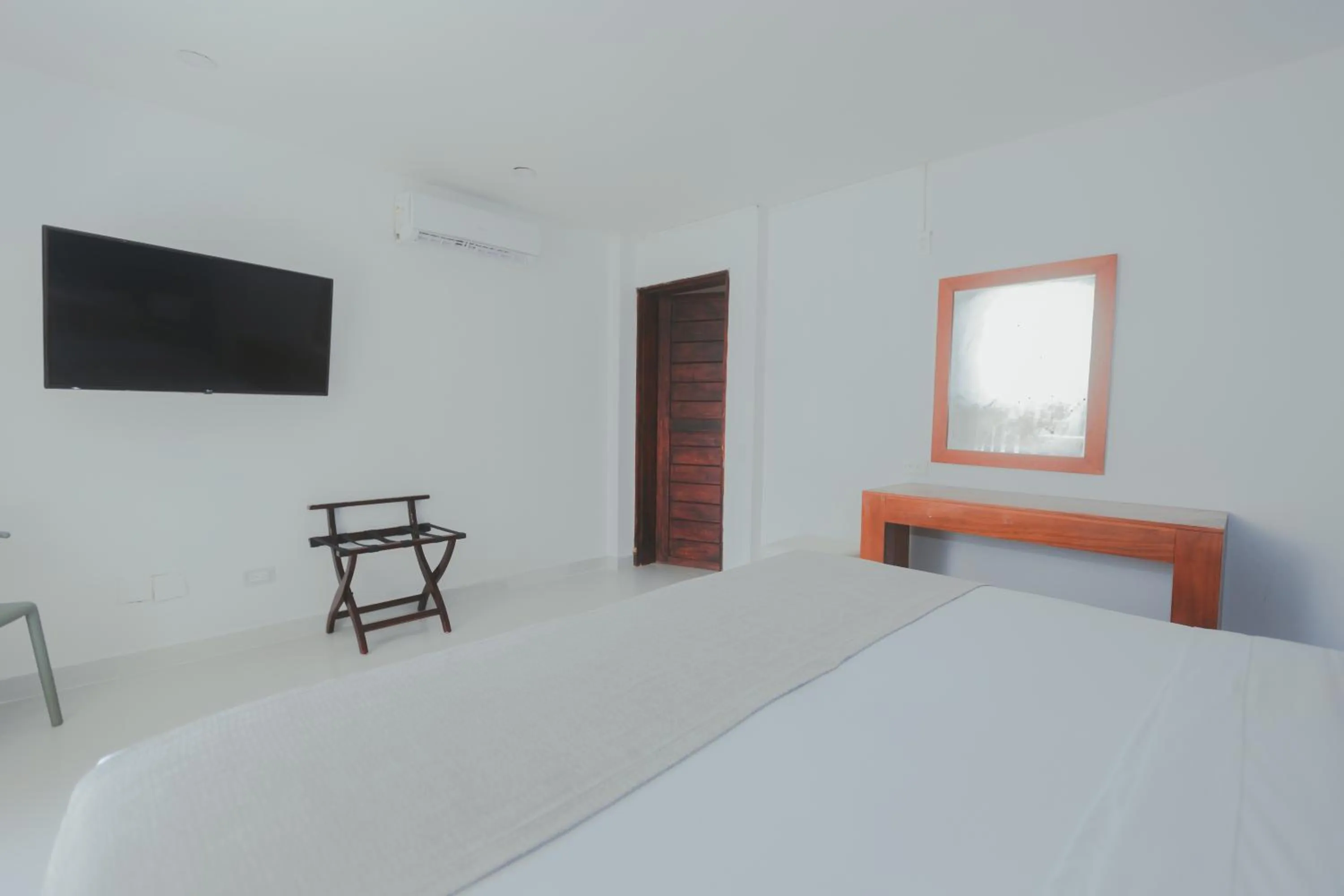 Bed in Hotel San Luis Beach House By OxoHotel