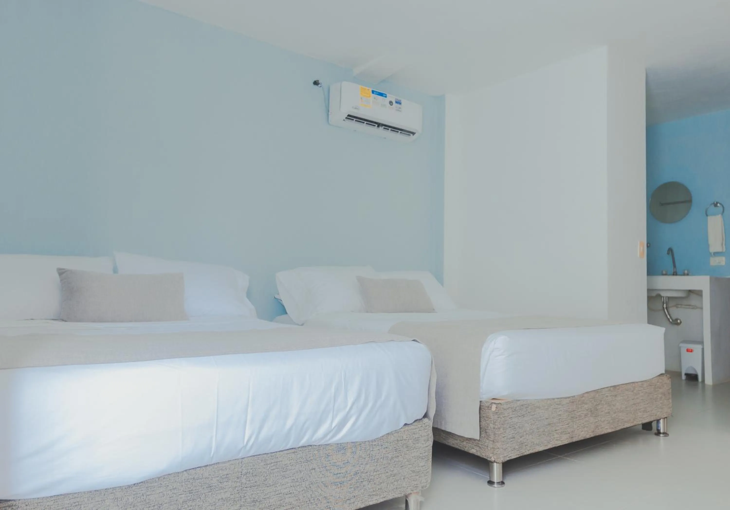 Bed in Hotel San Luis Beach House By OxoHotel
