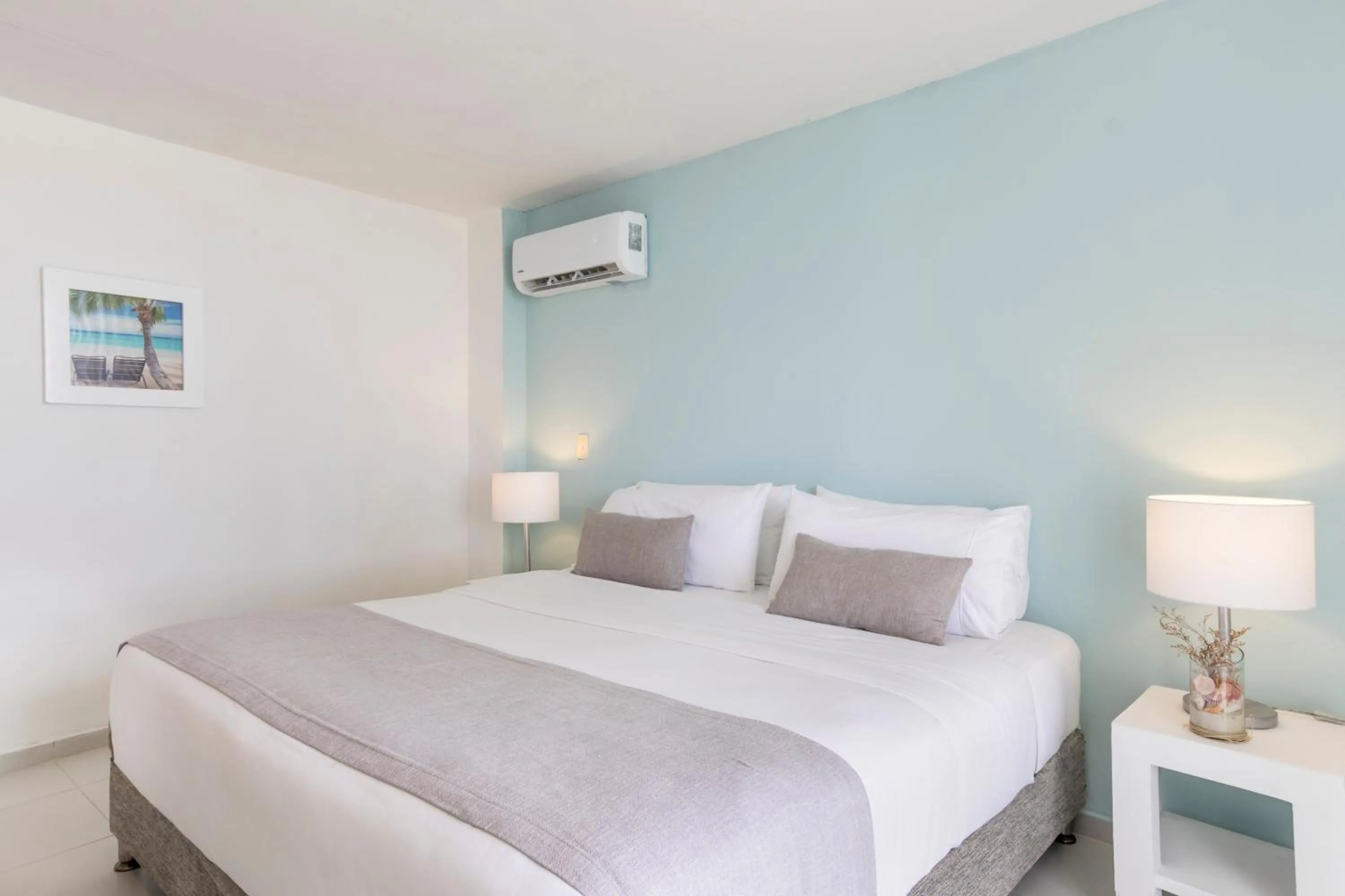 Bed in Hotel San Luis Beach House By OxoHotel