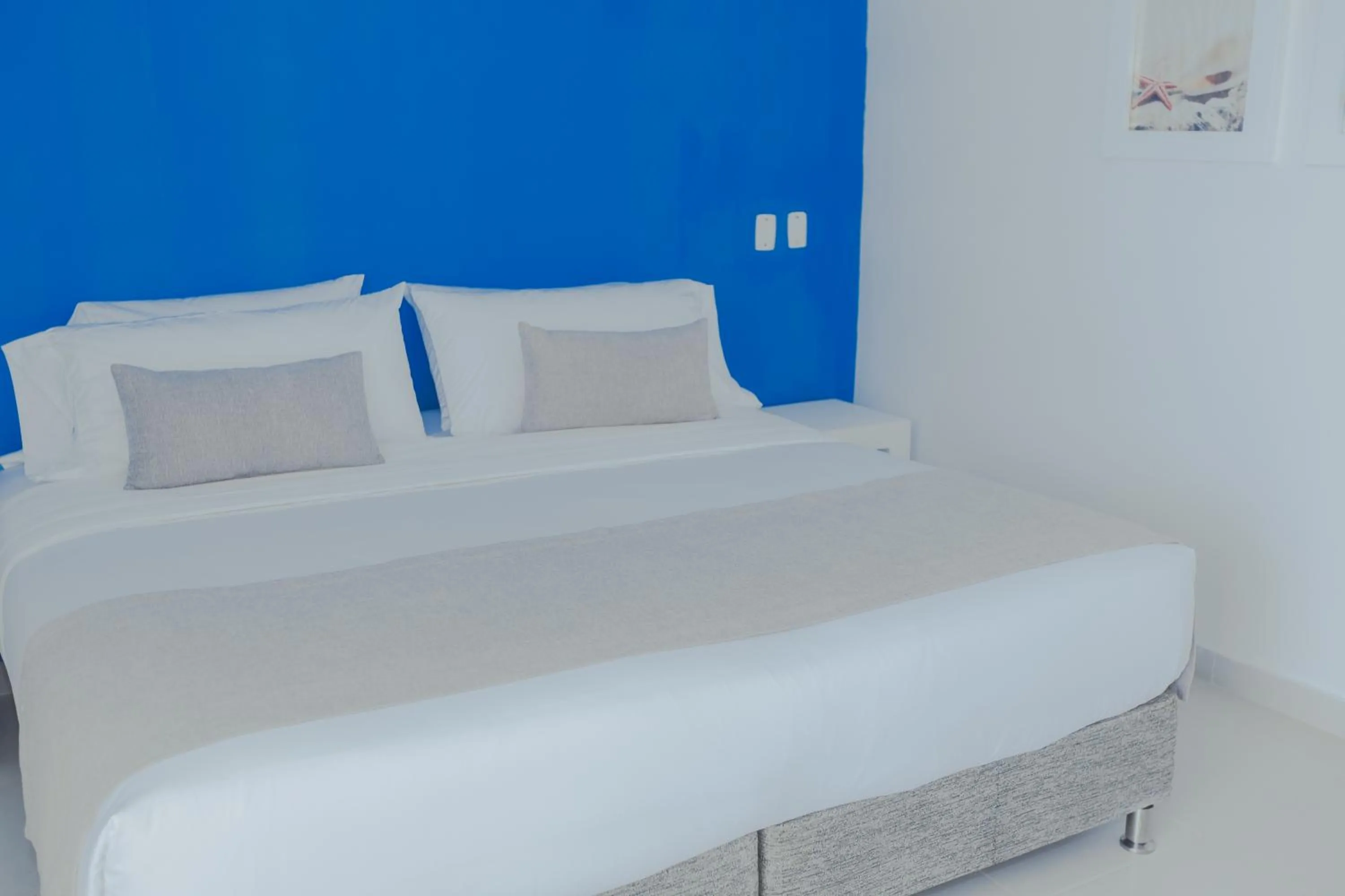 Bed in Hotel San Luis Beach House By OxoHotel