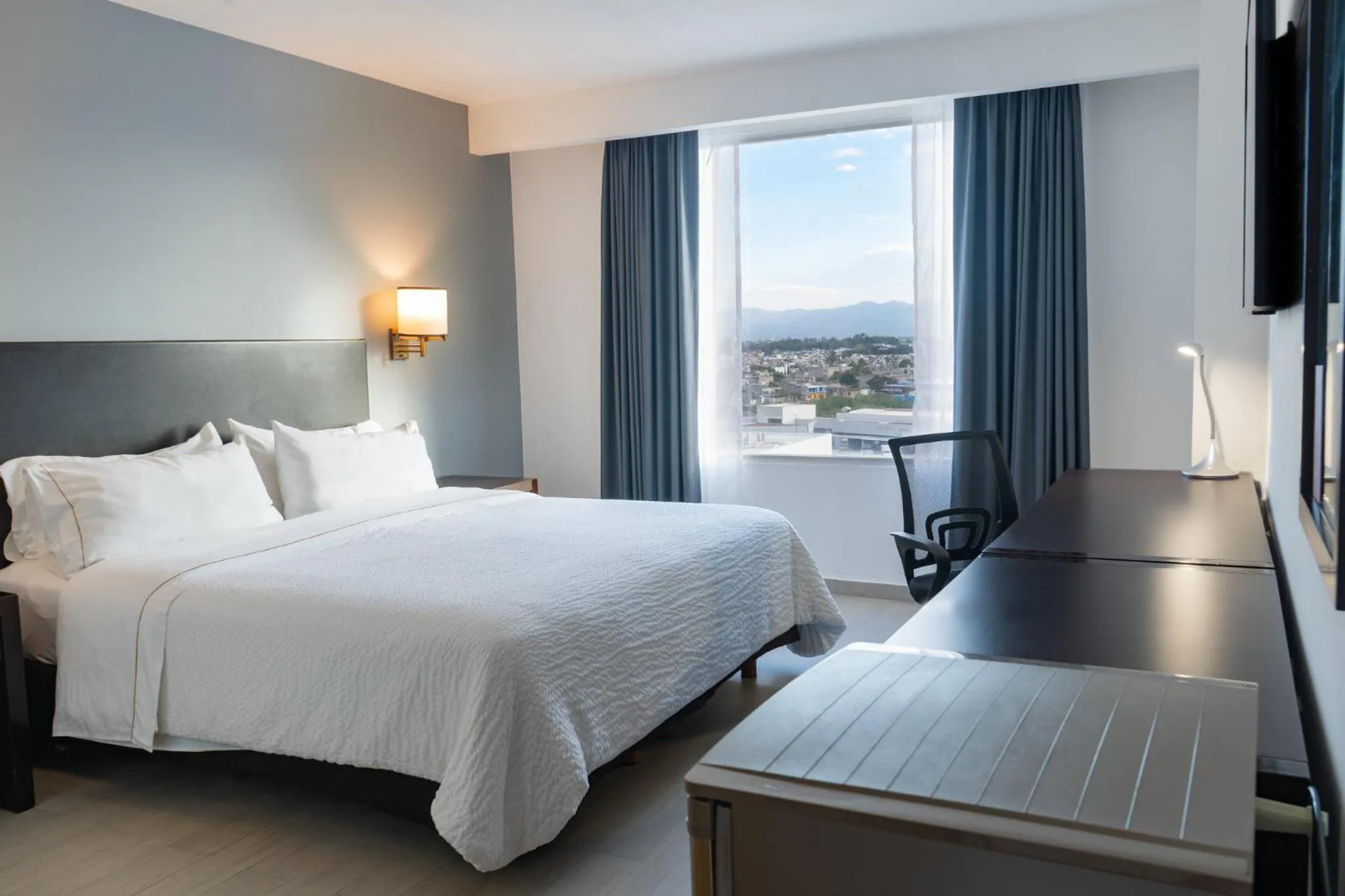 Photo of the whole room, Bed in Fiesta Inn Tepic