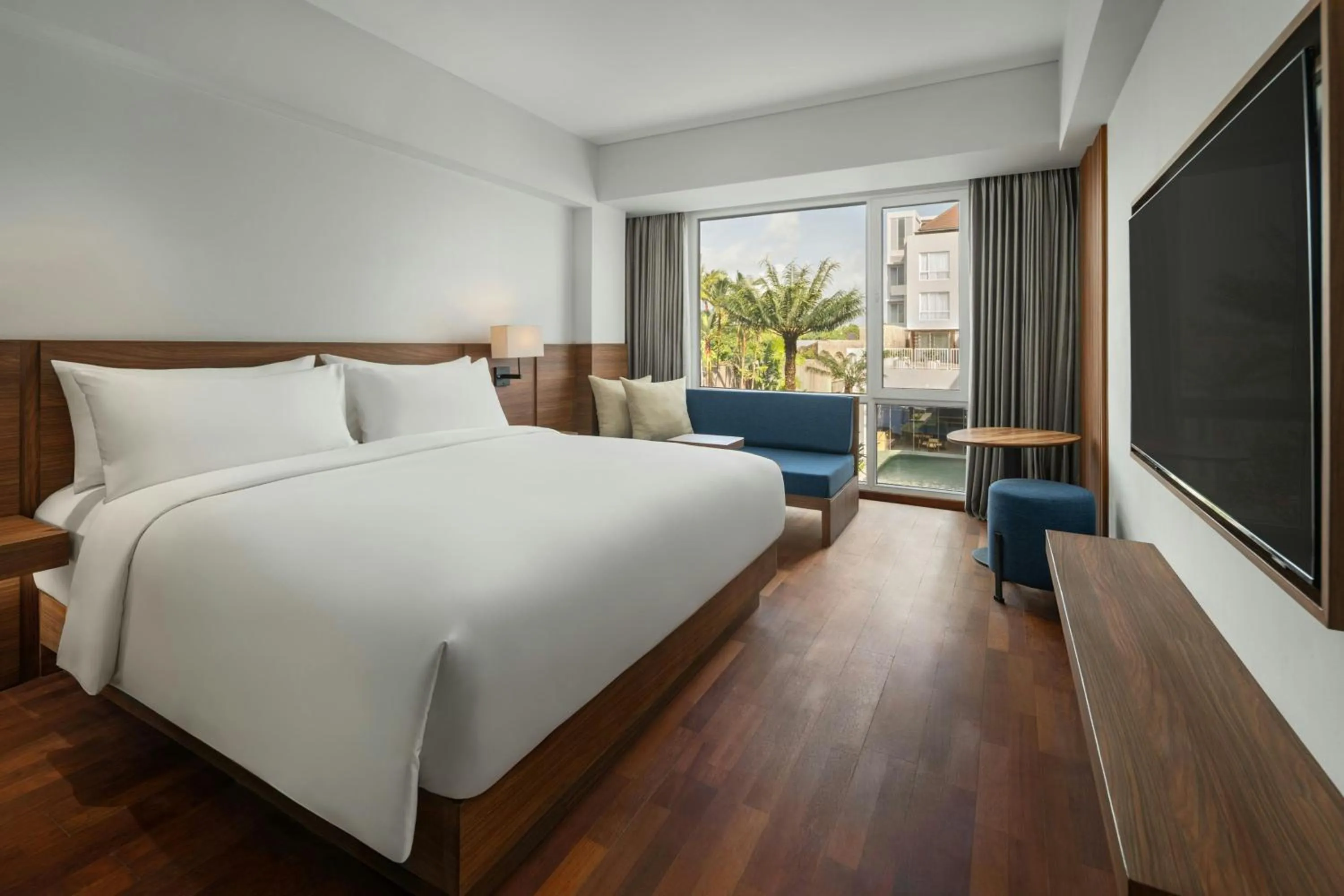 Swimming pool, Bed in Fairfield by Marriott Bali Kuta Ngurah Rai