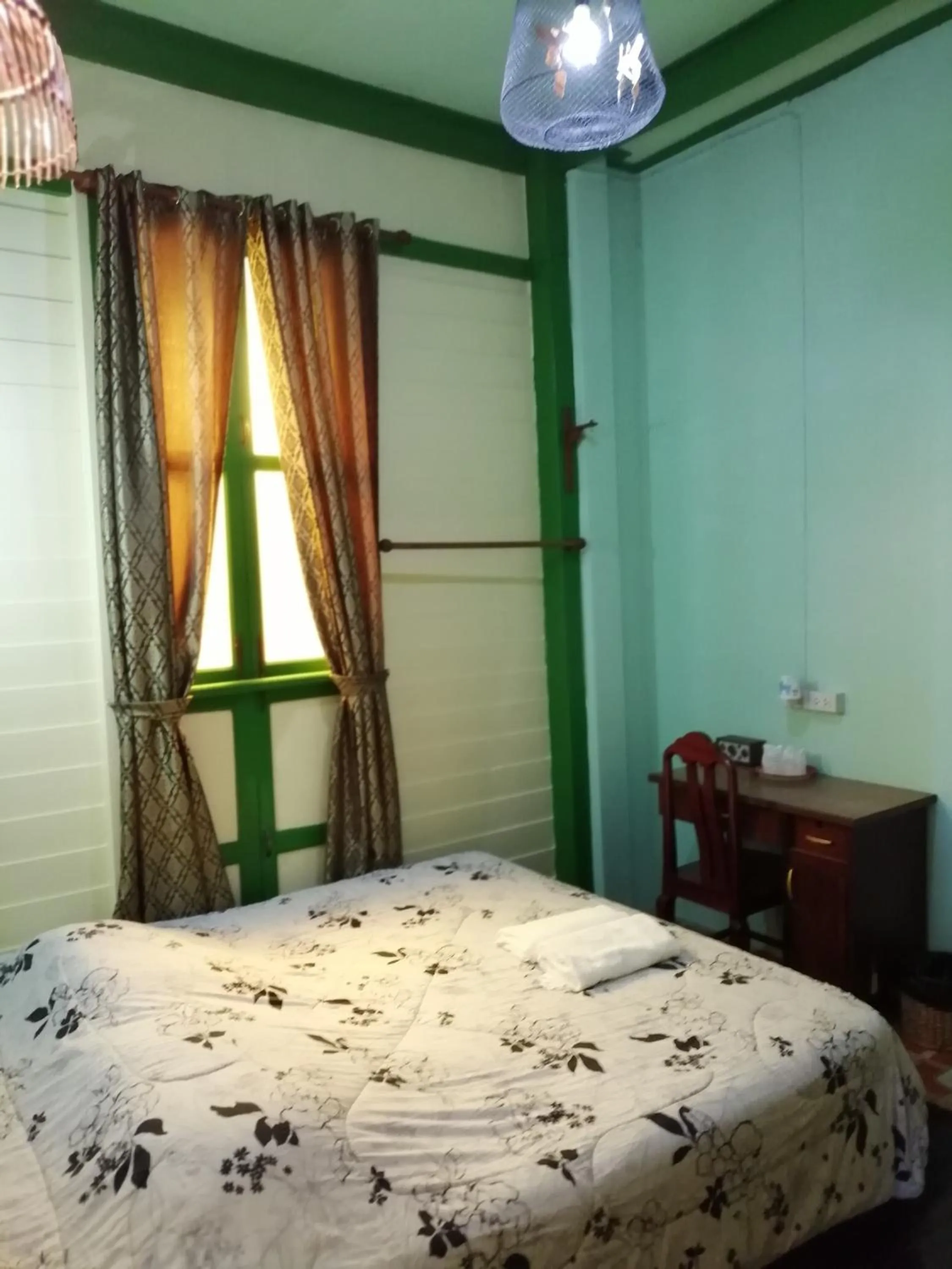 Bed in Baan Tepa Boutique House