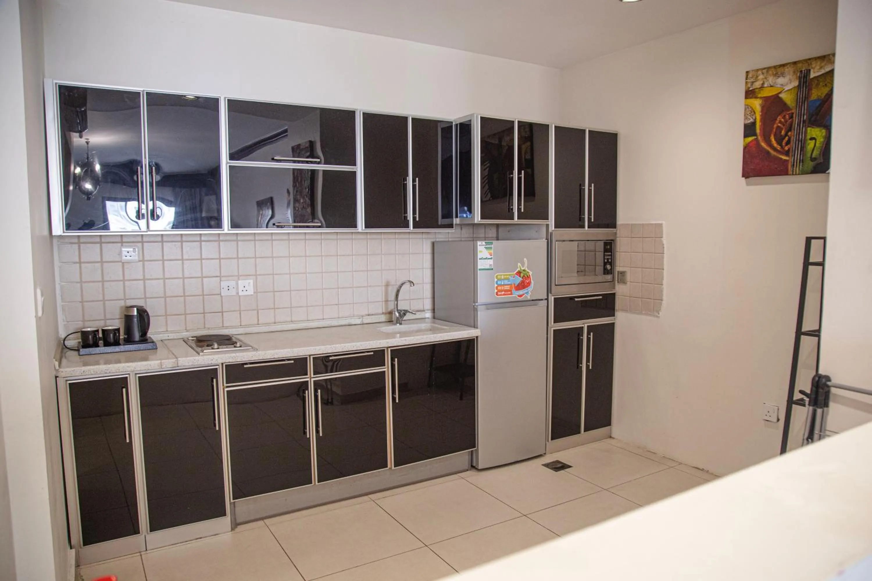 Kitchen or kitchenette in أورانس العالمية - Orans Suites