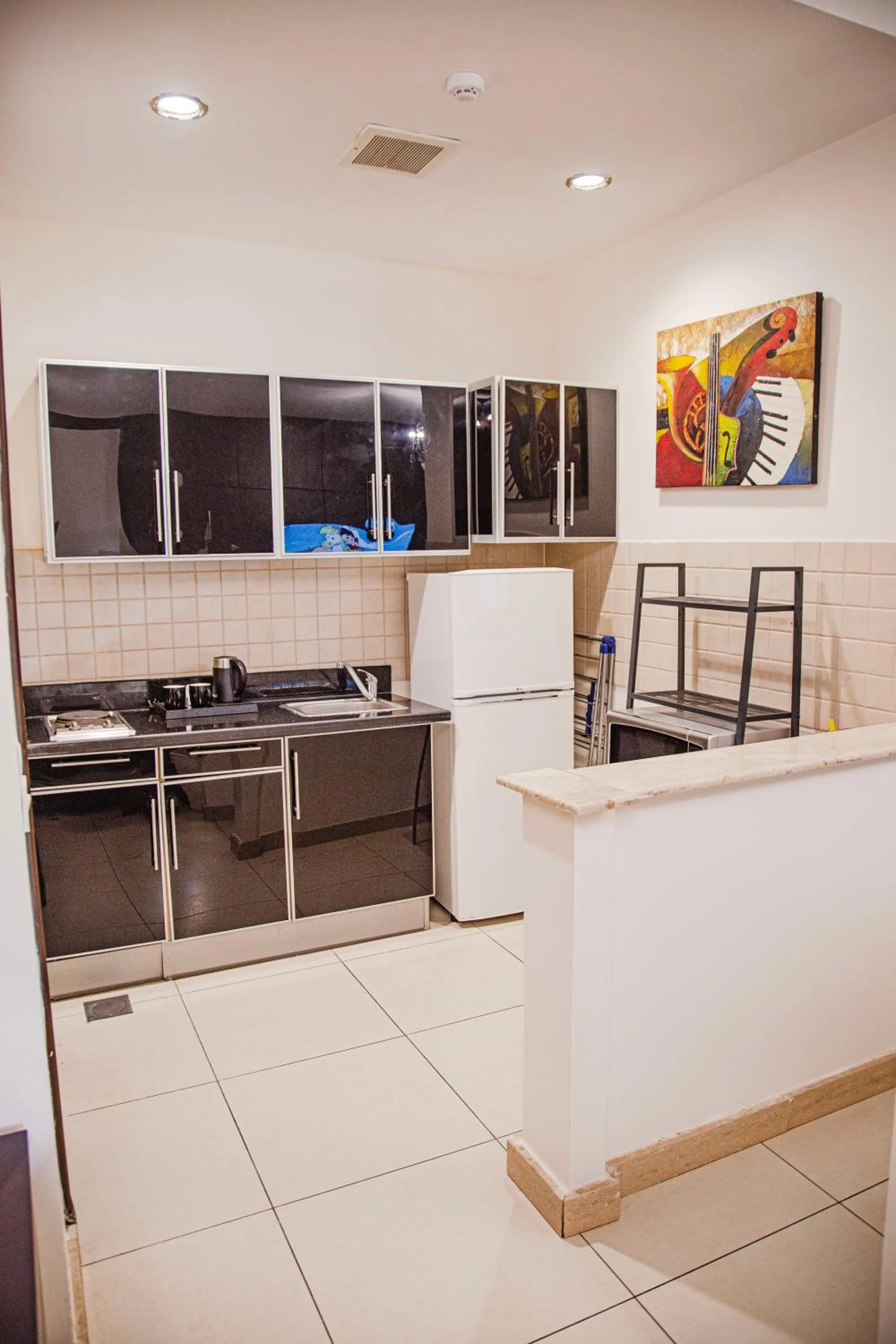 Kitchen or kitchenette in أورانس العالمية - Orans Suites