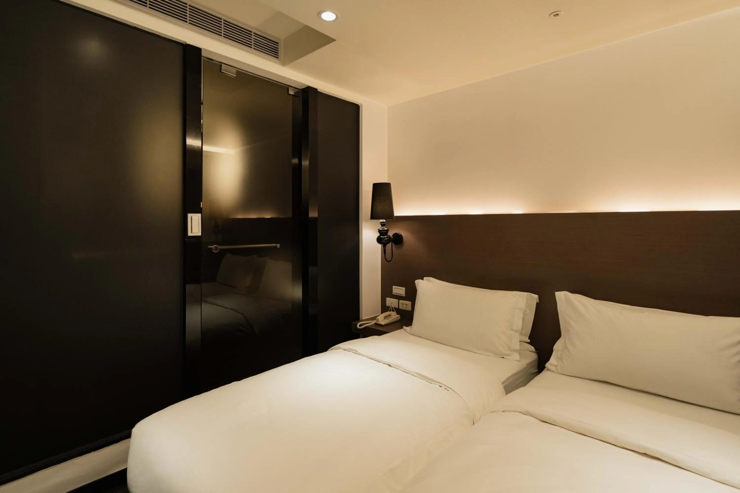 Bed in SWIIO Hotel Ximending