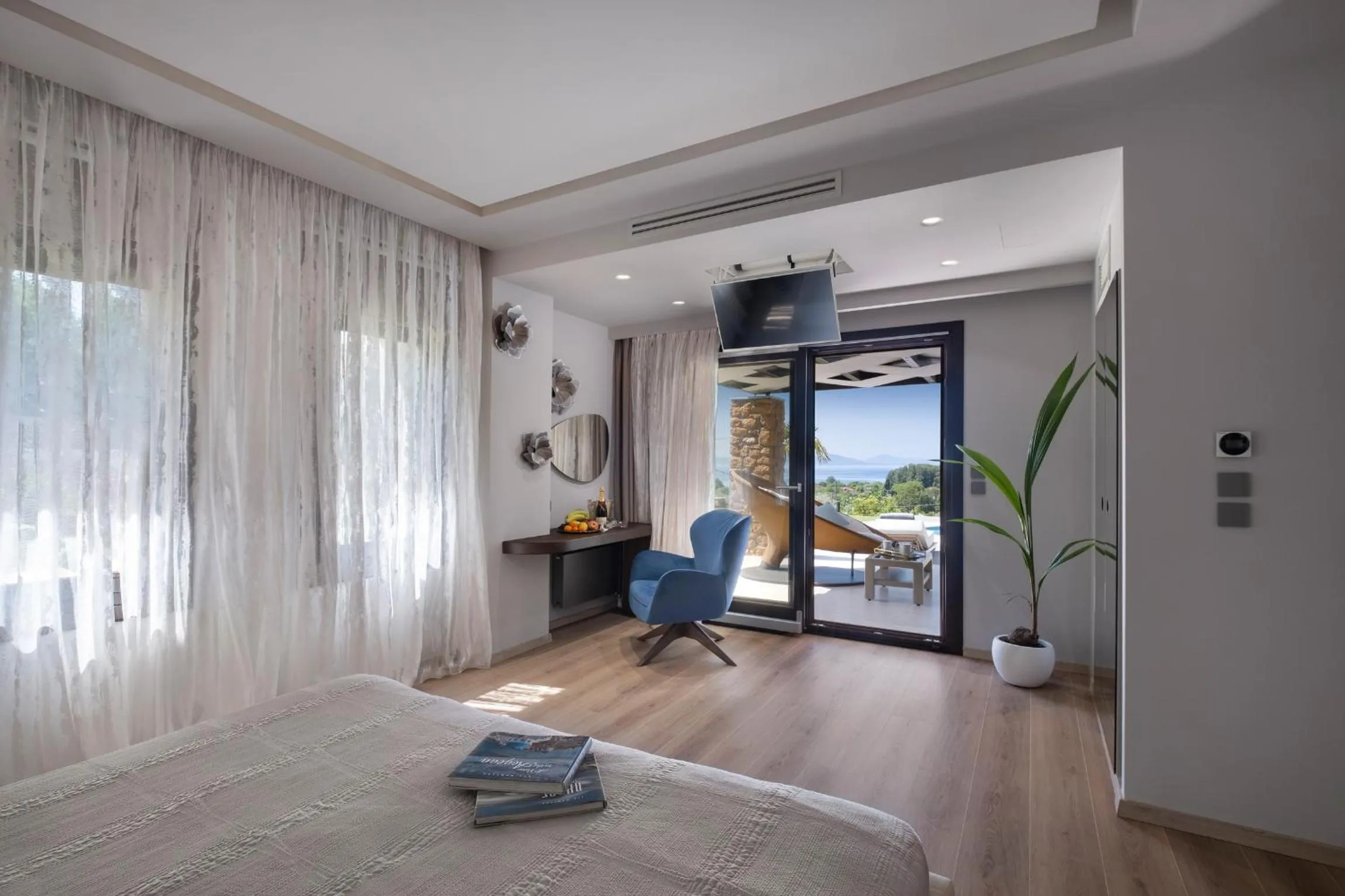 Bed in Iakovakis Suites & Spa