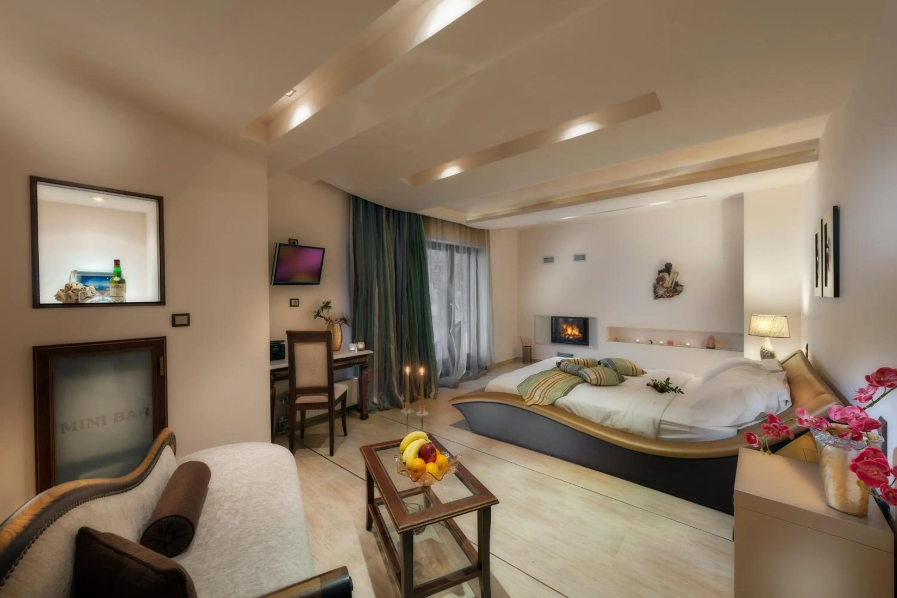 Photo of the whole room, Bed in Iakovakis Suites & Spa