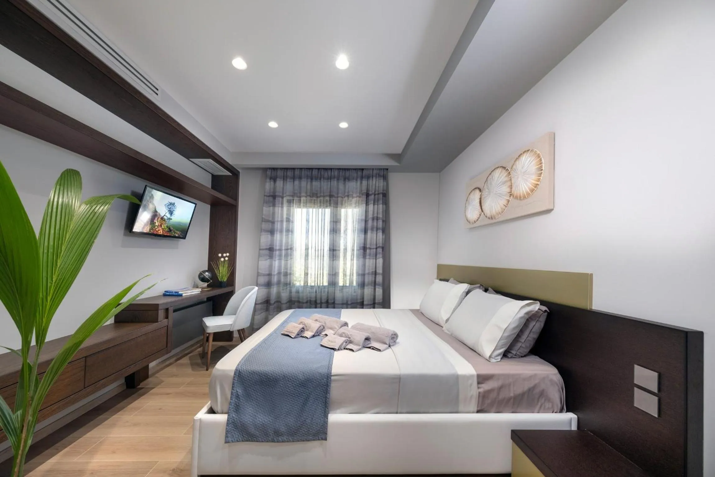 Bed in Iakovakis Suites & Spa