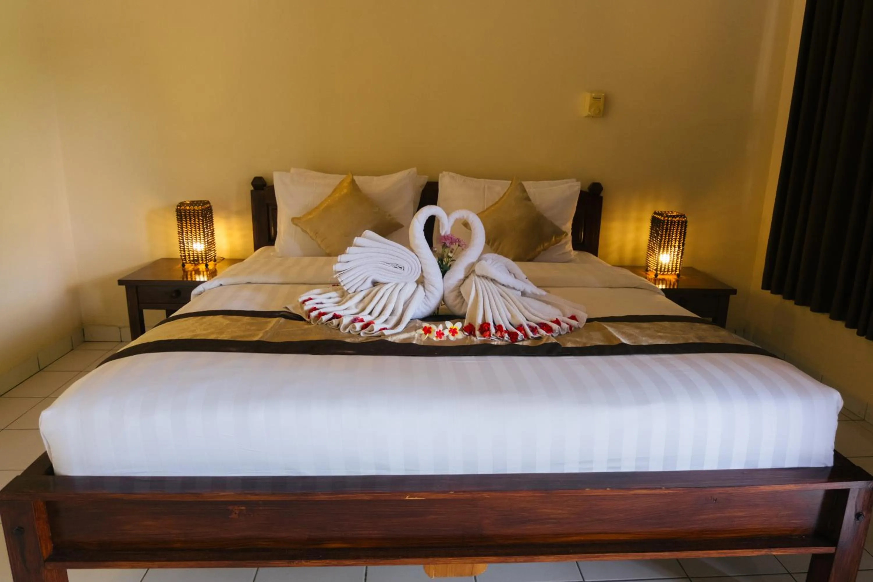 Bed in New Starlight Hotel Lovina