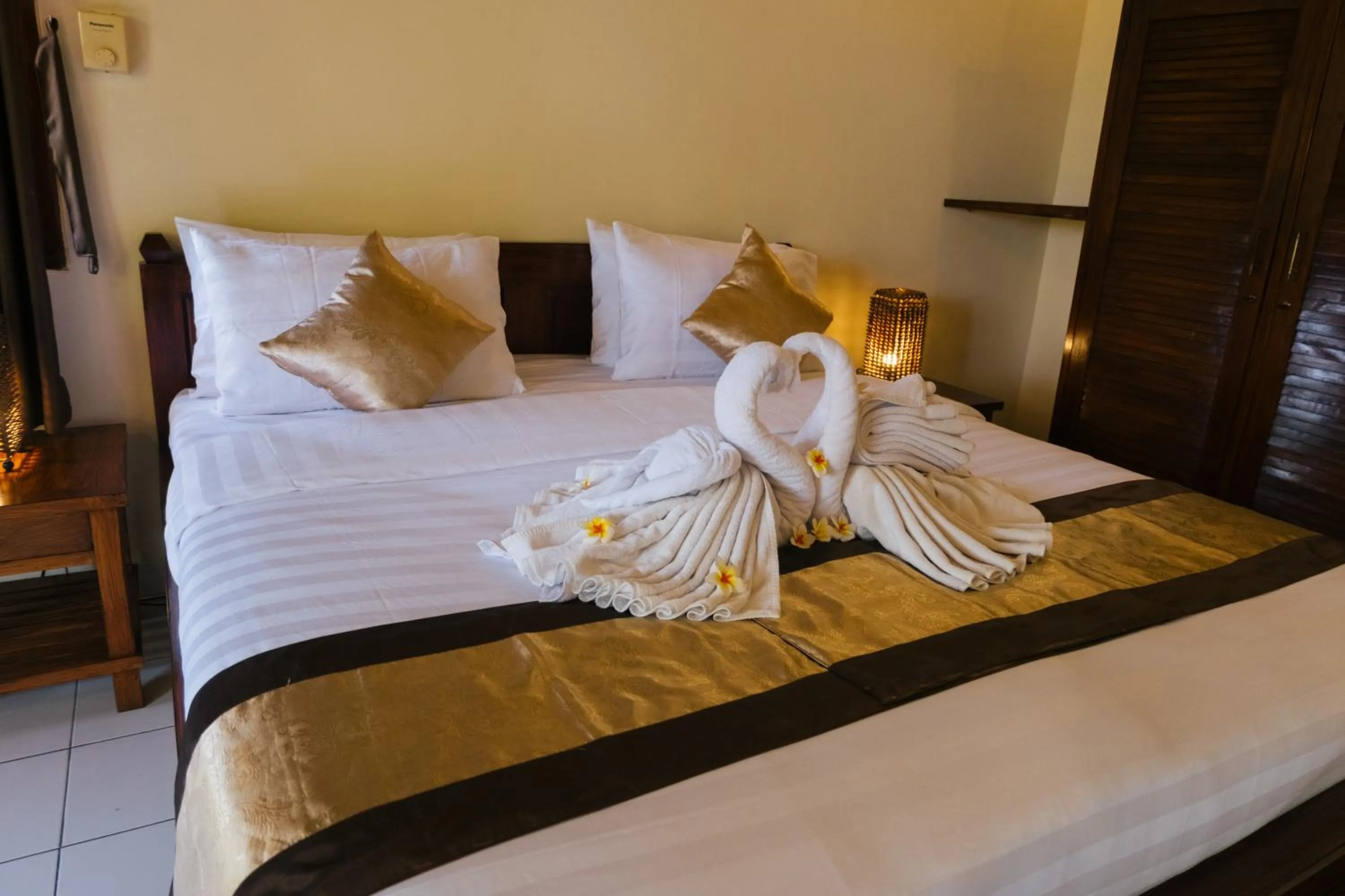 Bed in New Starlight Hotel Lovina