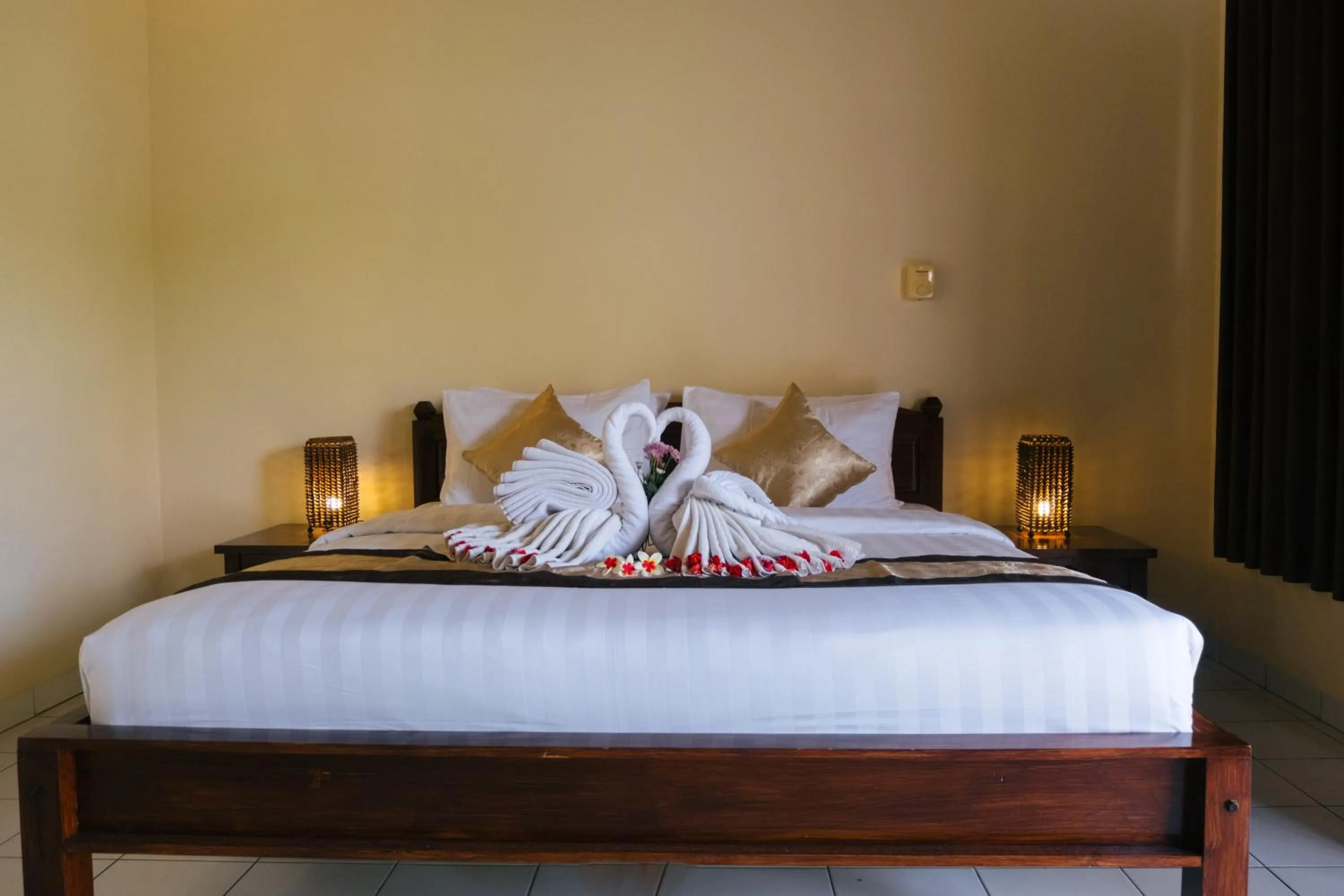 Bed in New Starlight Hotel Lovina