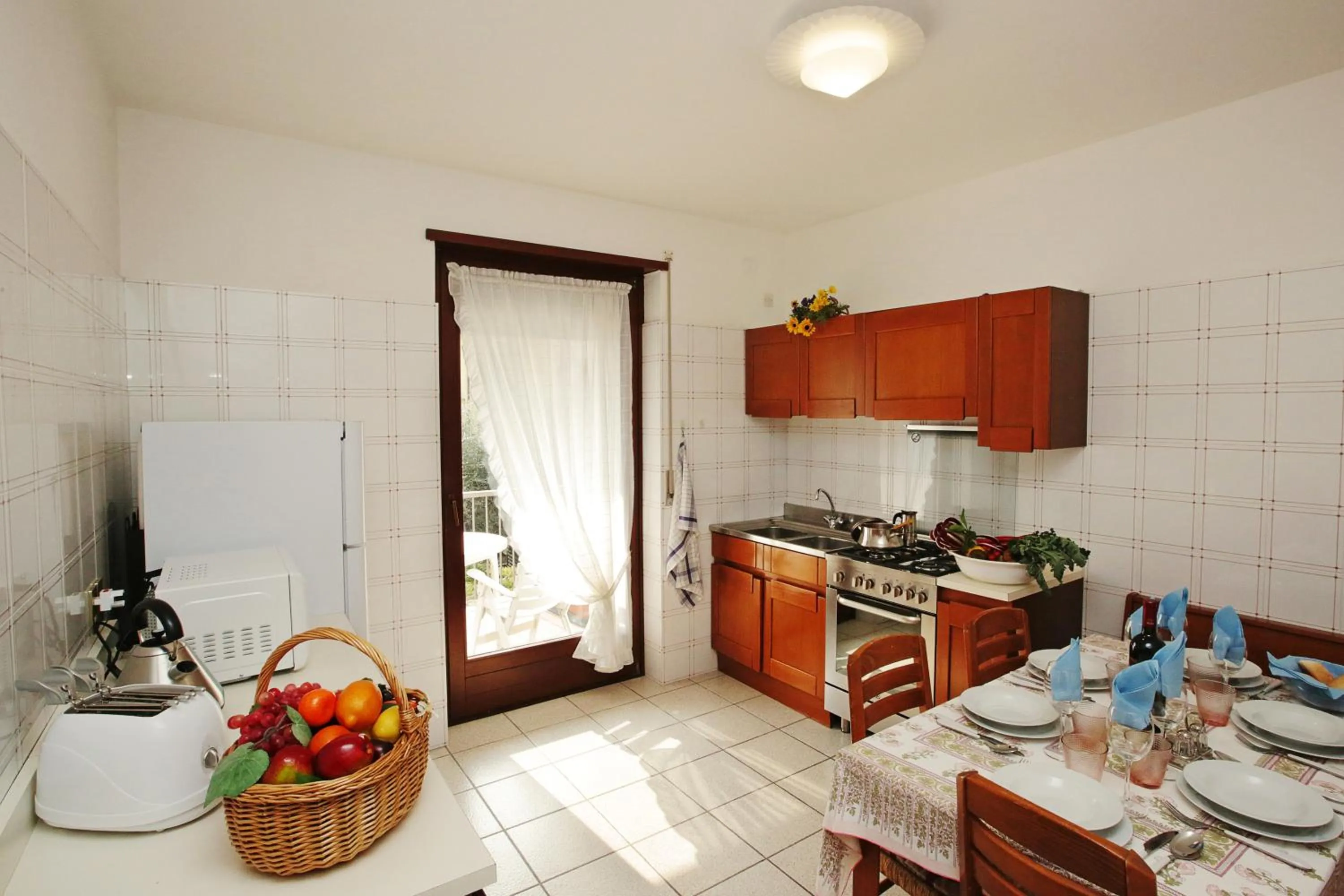 Kitchen or kitchenette in Appartamento Emma - Happy Rentals