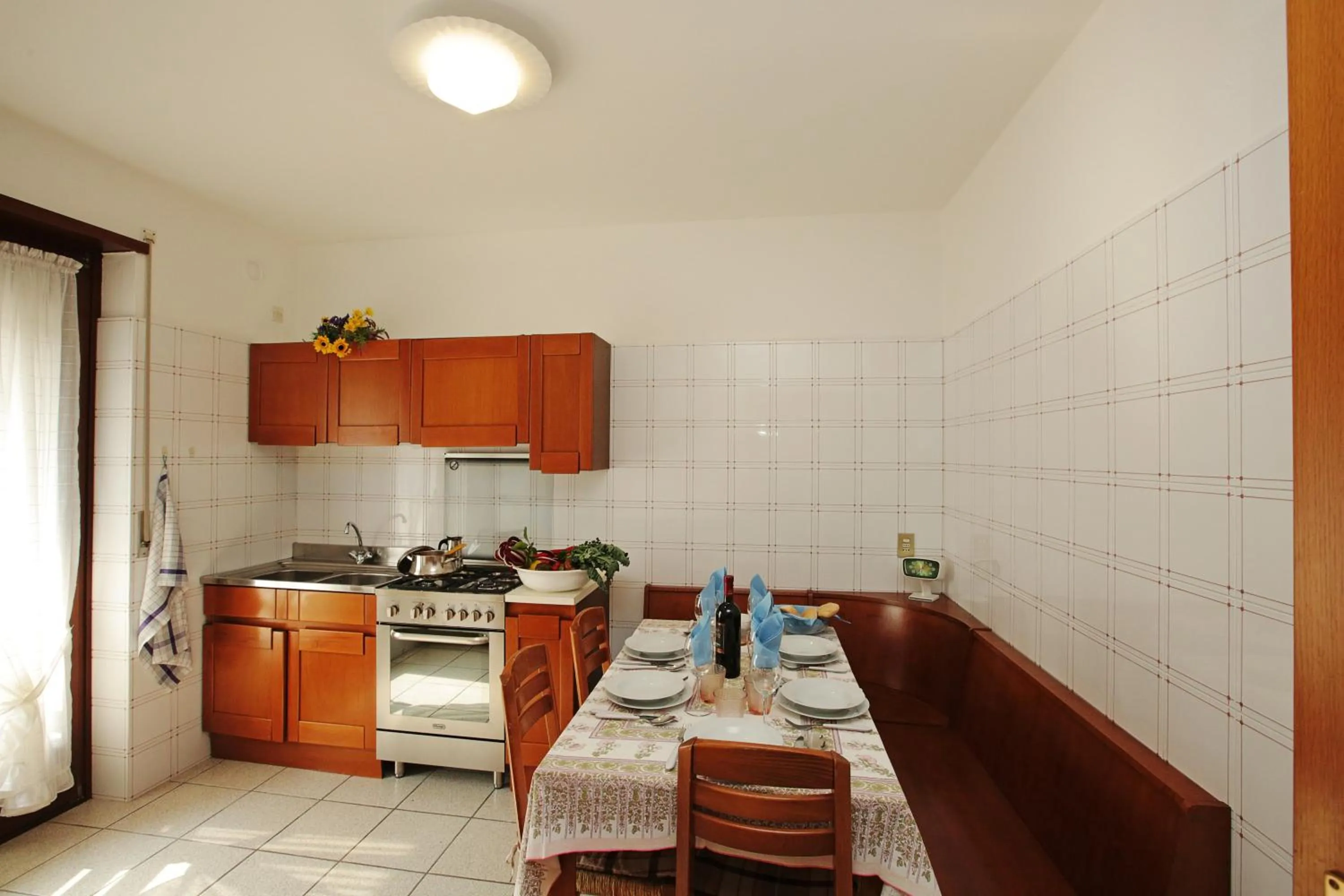 Kitchen or kitchenette in Appartamento Emma - Happy Rentals
