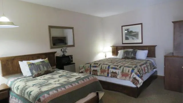 Photo of the whole room, Bed in Tug Hill Resort