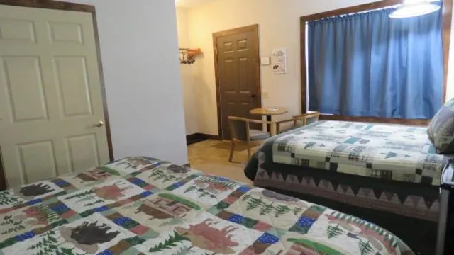 Photo of the whole room, Bed in Tug Hill Resort