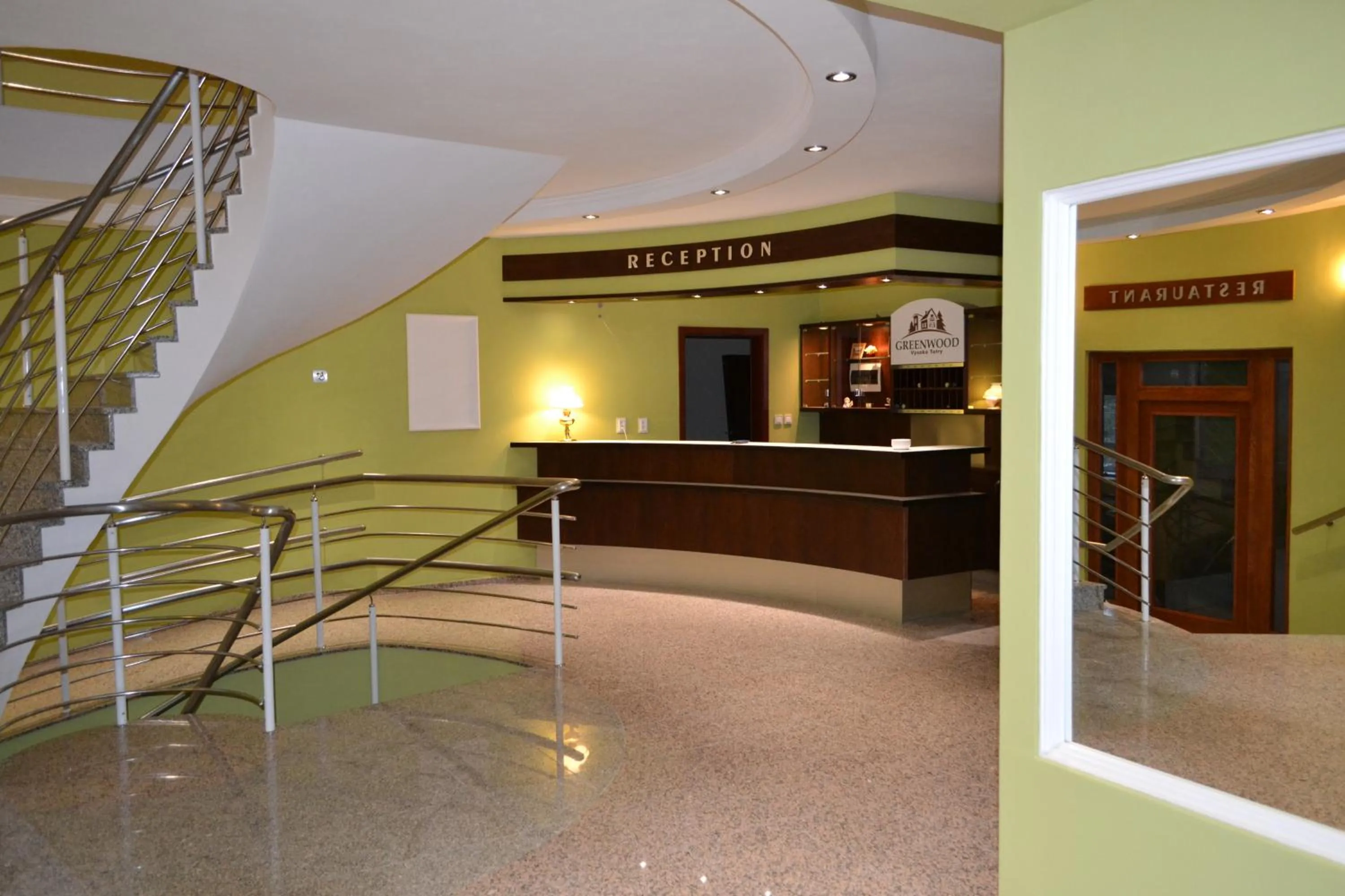 Property logo or sign in Greenwood hotel