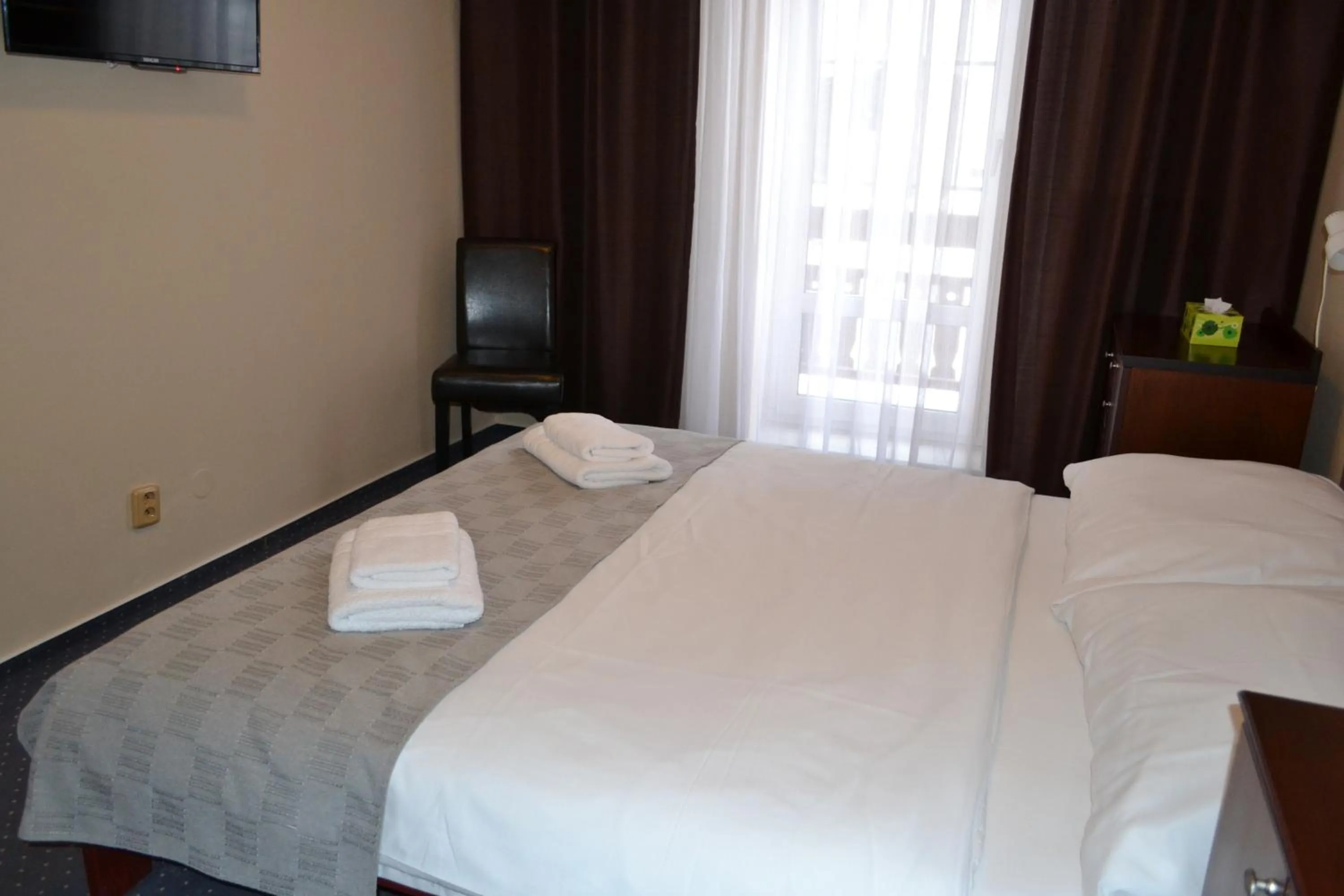 Bed in Greenwood hotel