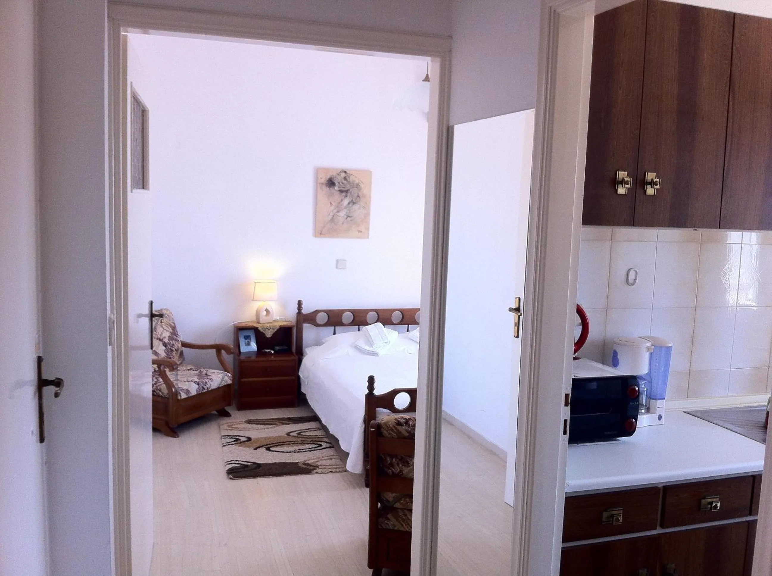 Bed in Chris Studios & Apartments