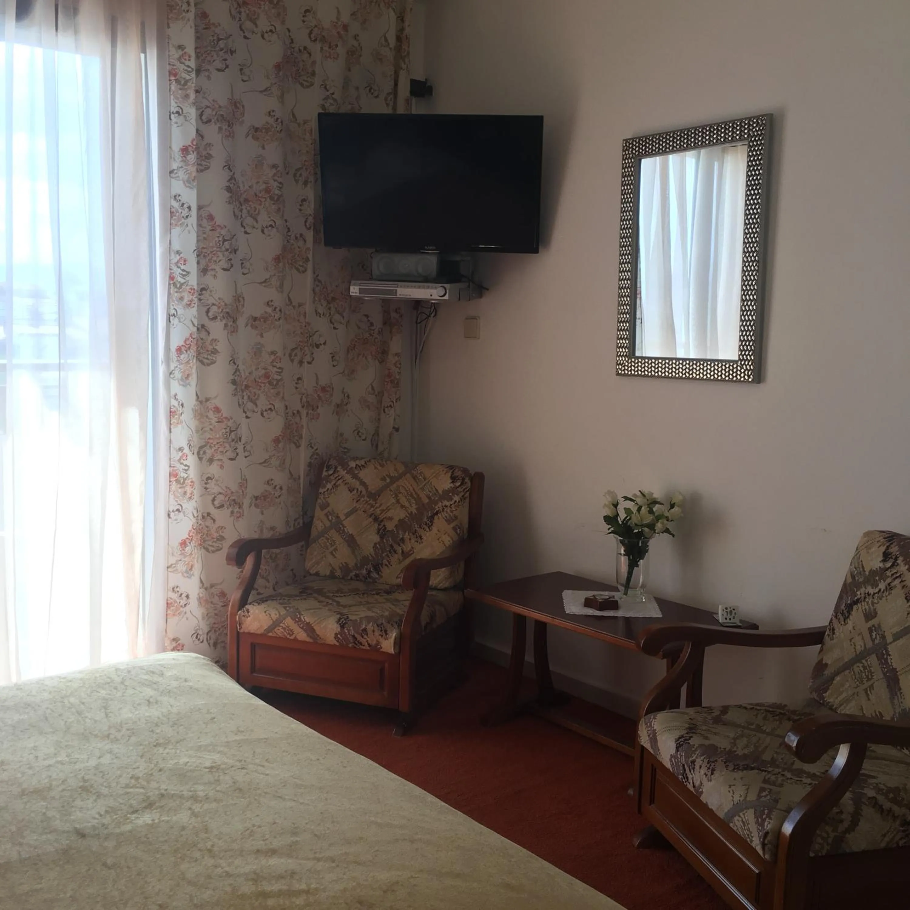 Bedroom in Chris Studios & Apartments