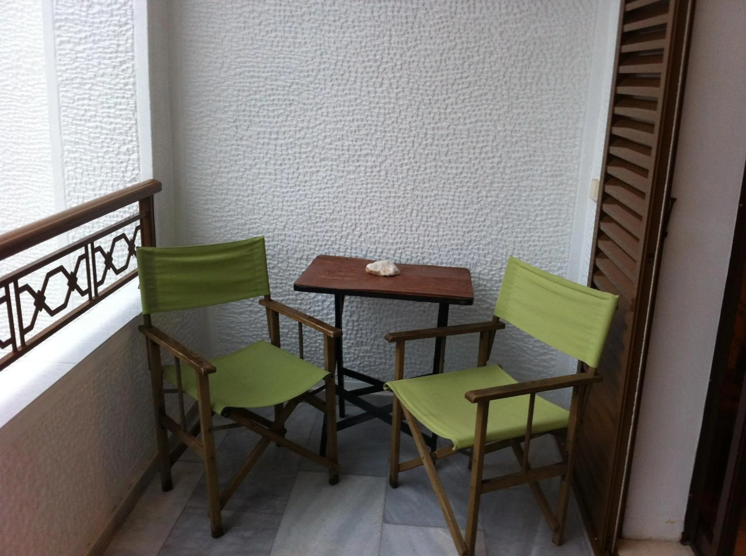 Seating area in Chris Studios & Apartments