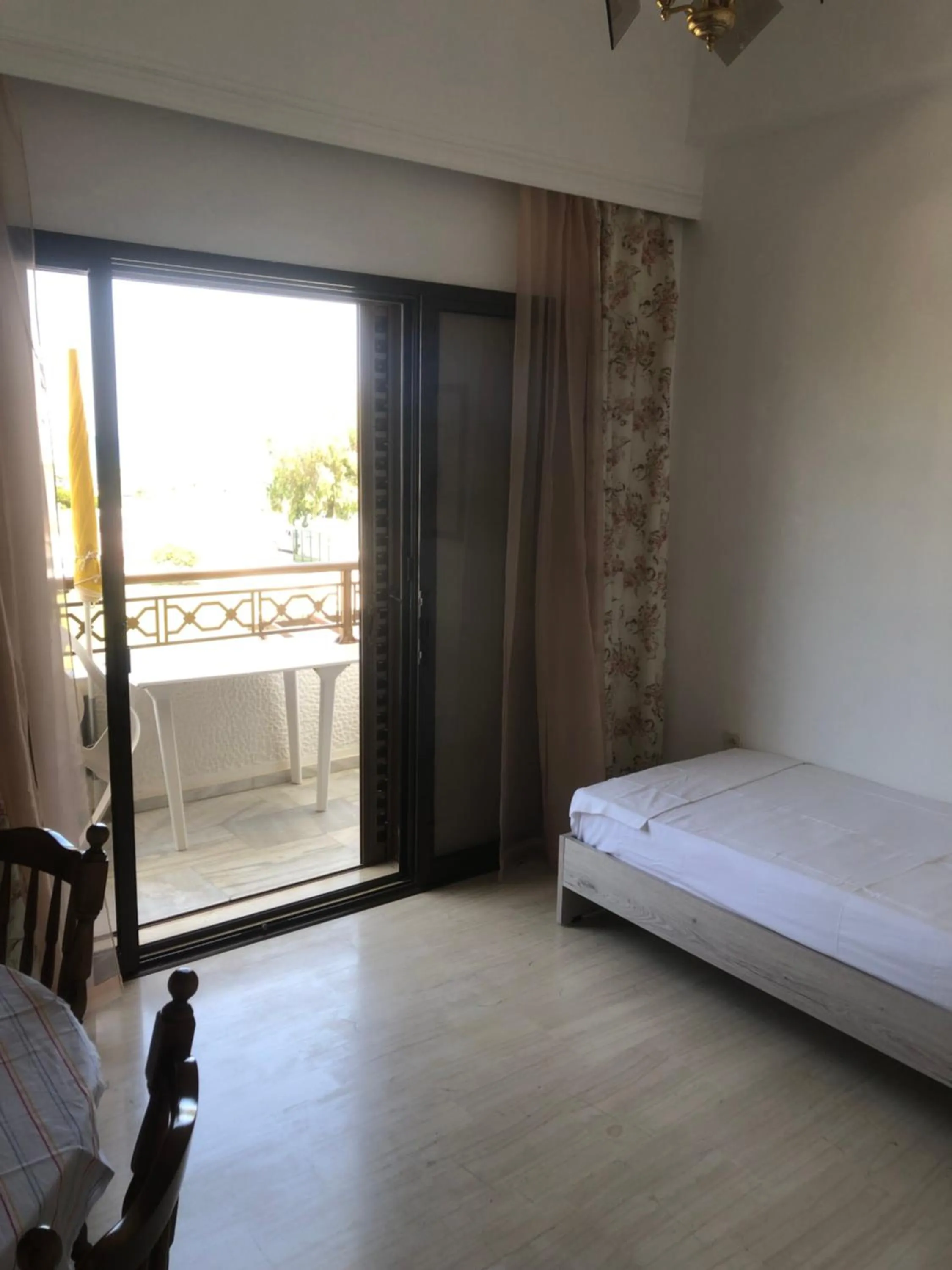 Living room, Bed in Chris Studios & Apartments