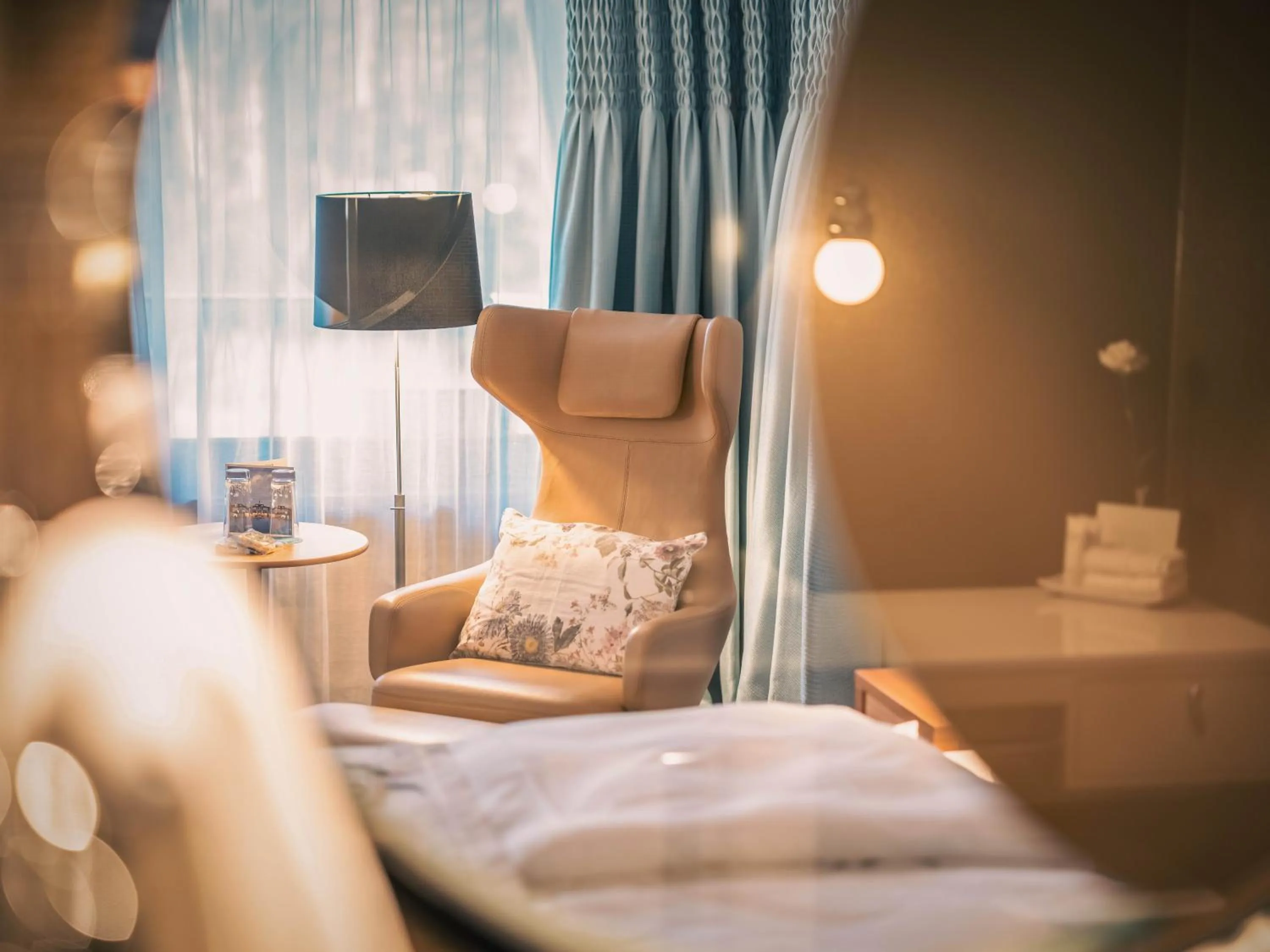 Seating area, Bed in Hof Weissbad Health & Wellness Resort