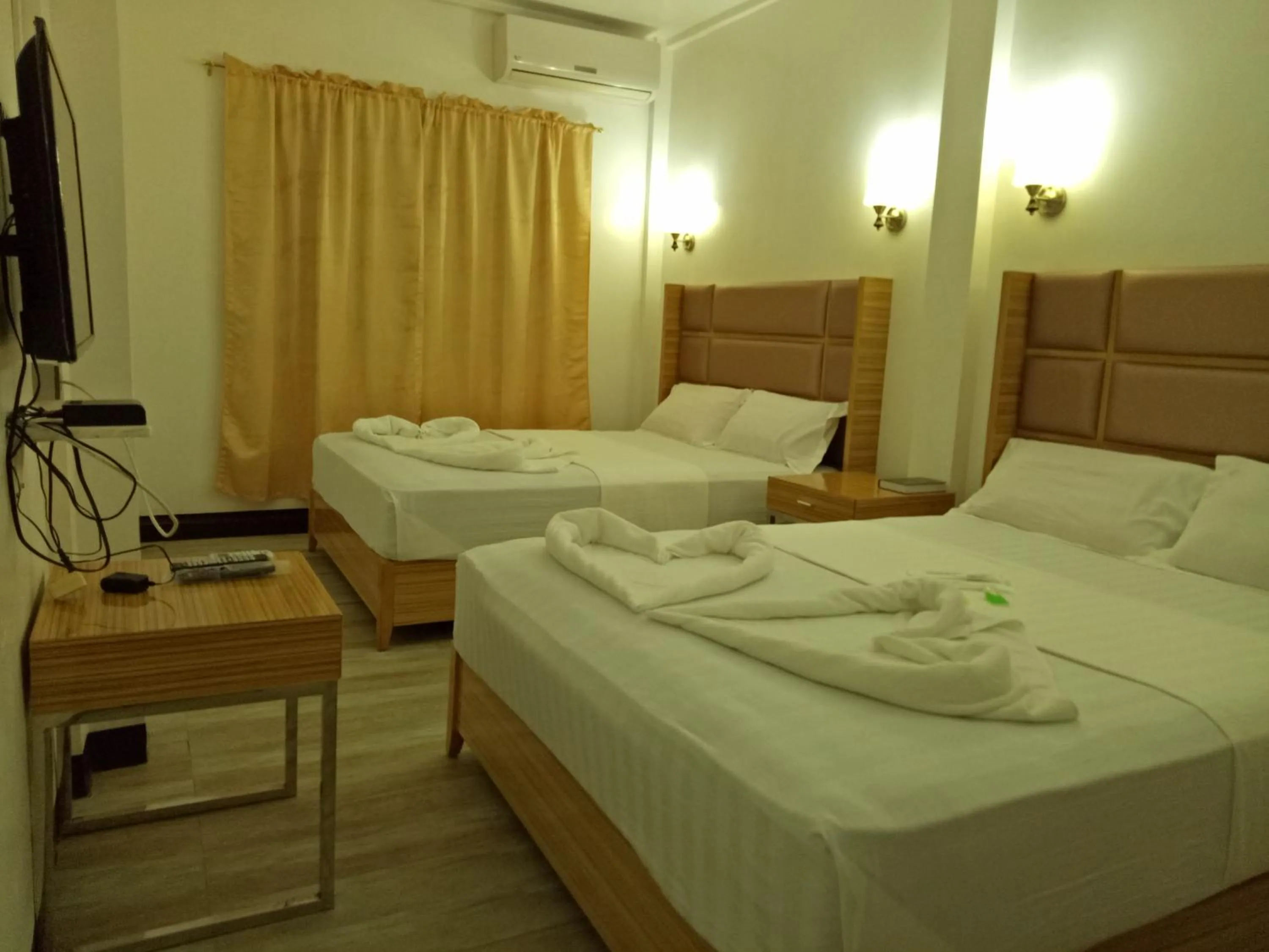 Bed in Meaco Hotel - Anilao