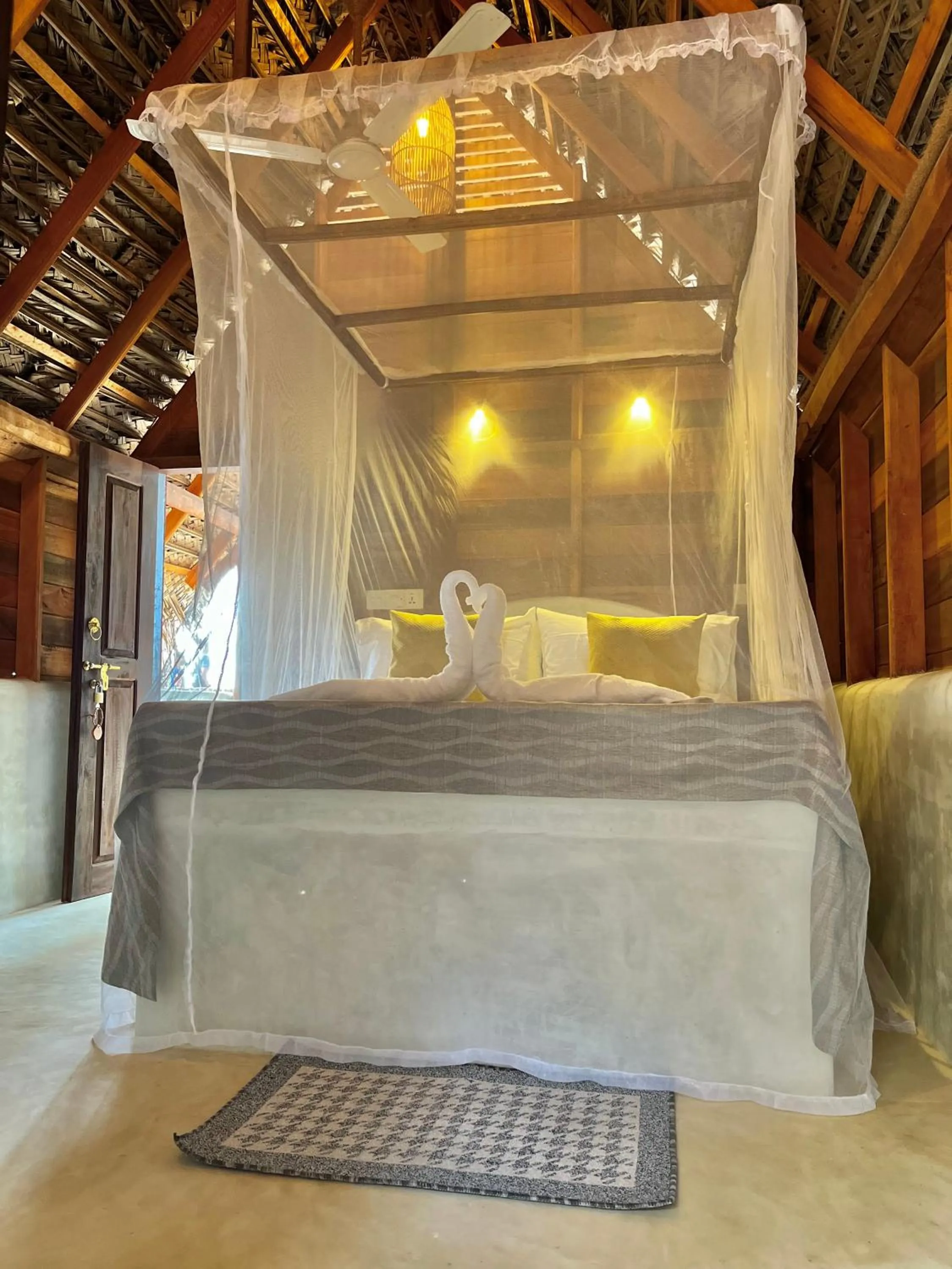 Bed in Windy Waves Beach Nature Resort & Kite School