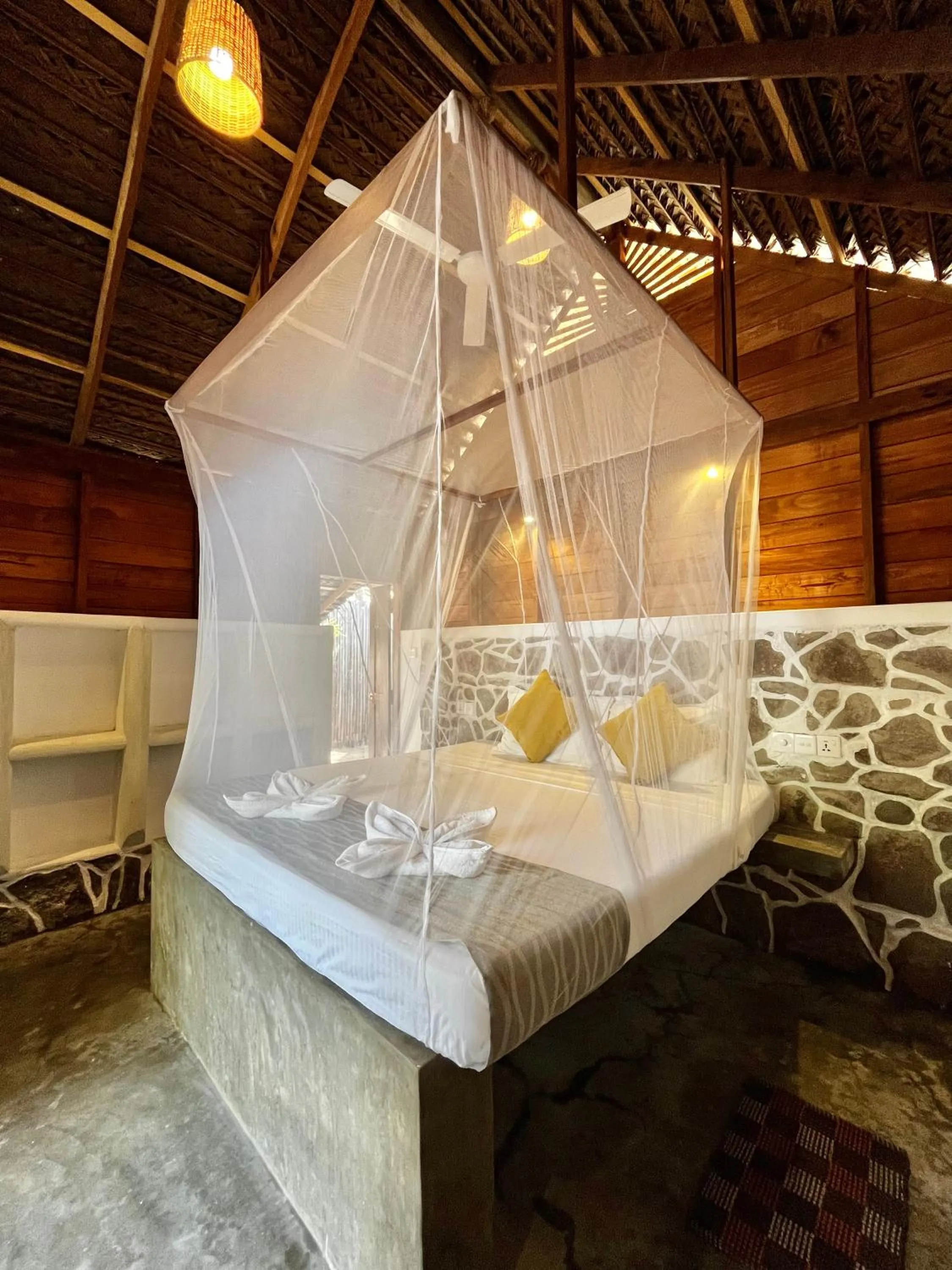 Bed in Windy Waves Beach Nature Resort & Kite School