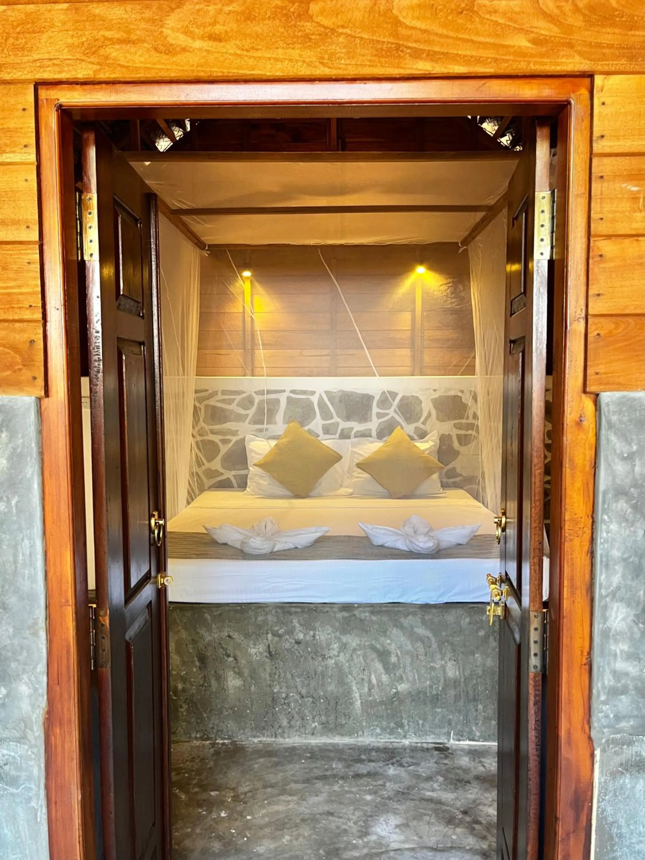 Bed in Windy Waves Beach Nature Resort & Kite School