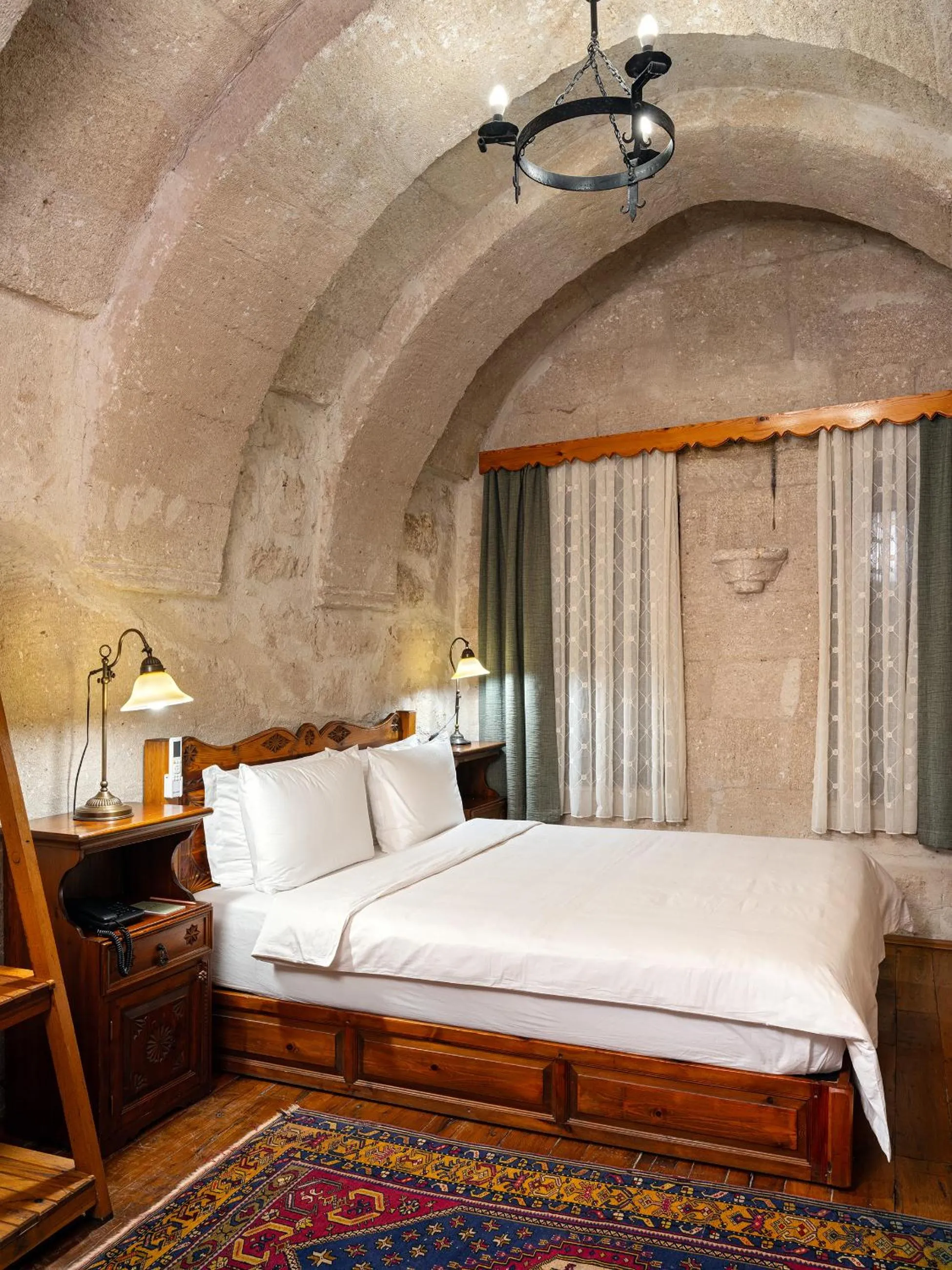 Bed in Kelebek Cave Hotel