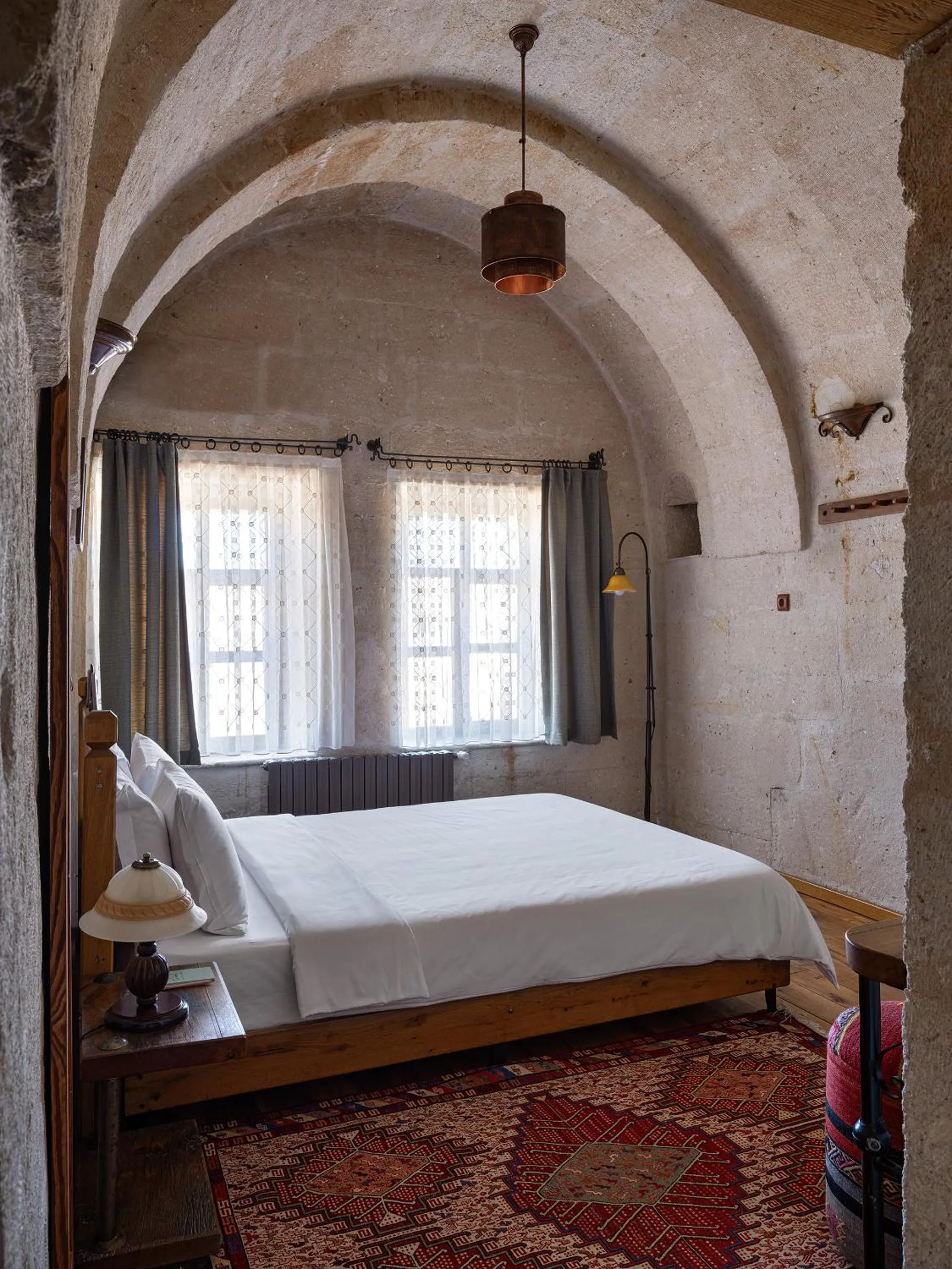 Bed in Kelebek Cave Hotel