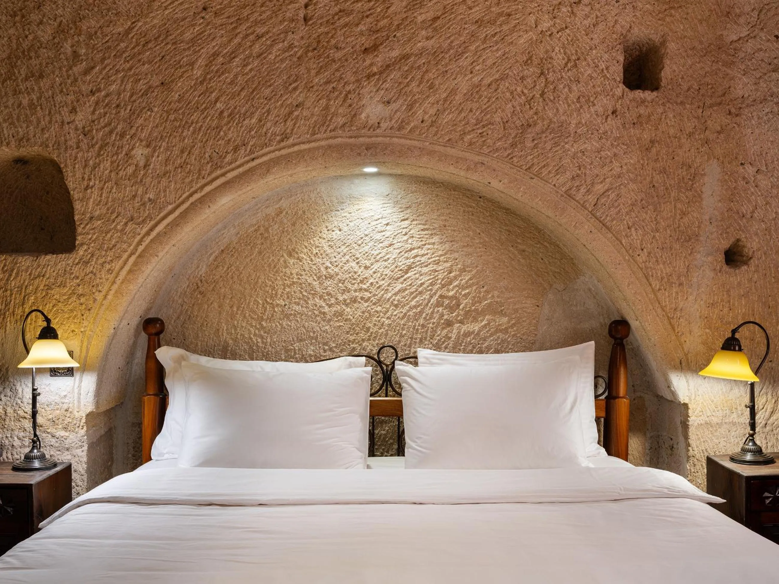 Bed in Kelebek Cave Hotel
