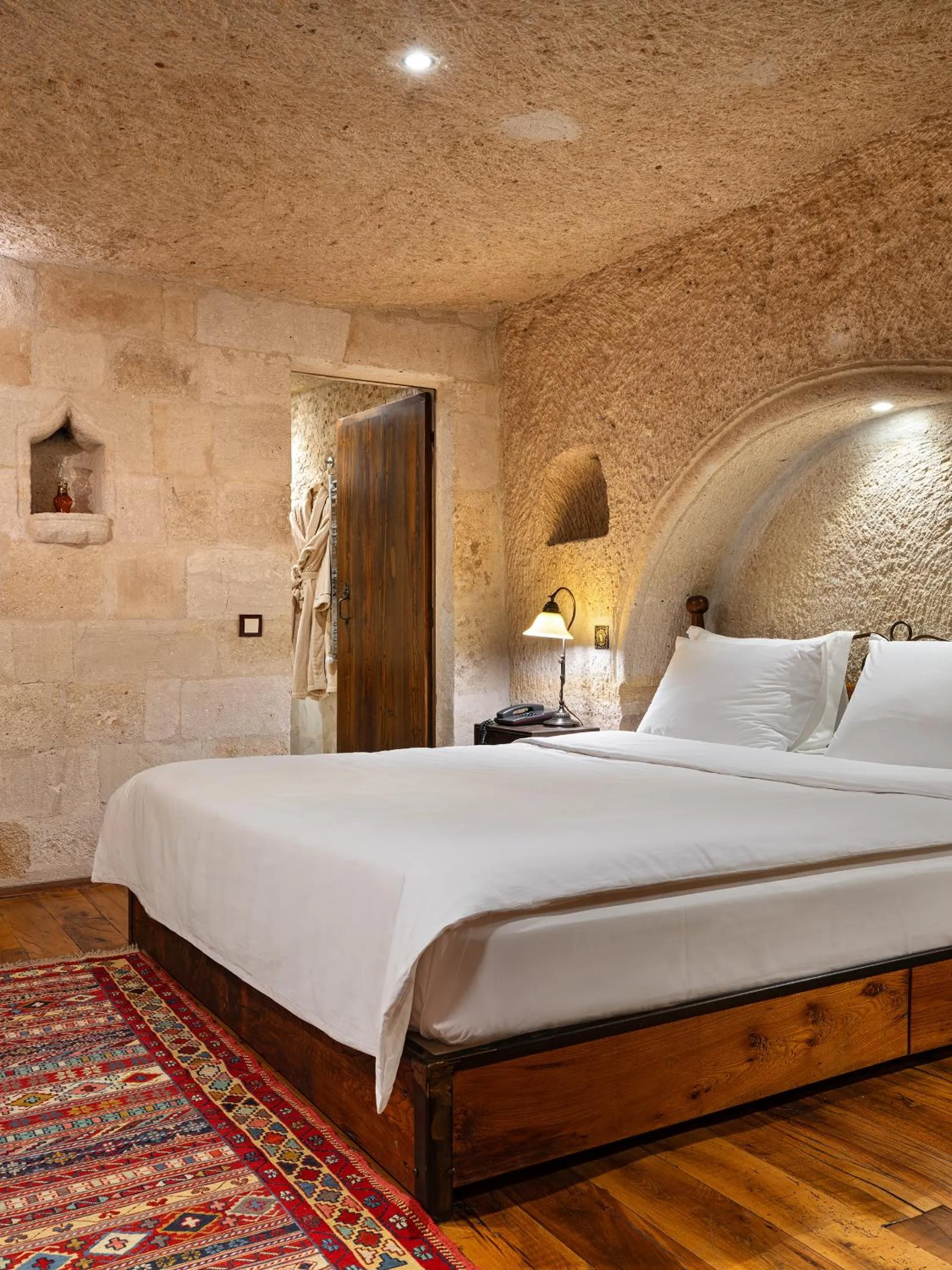 Bed in Kelebek Cave Hotel
