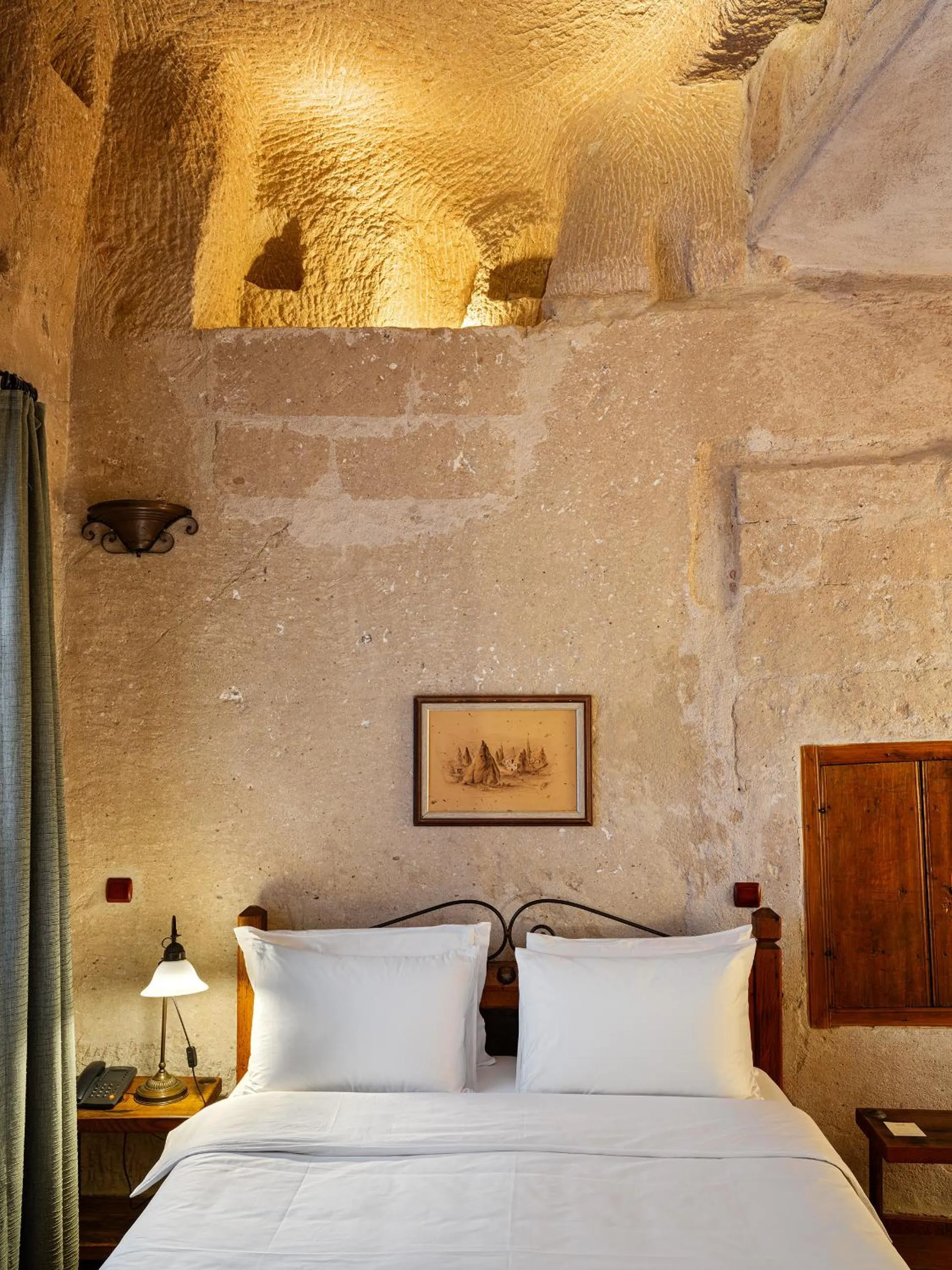 Bed in Kelebek Cave Hotel