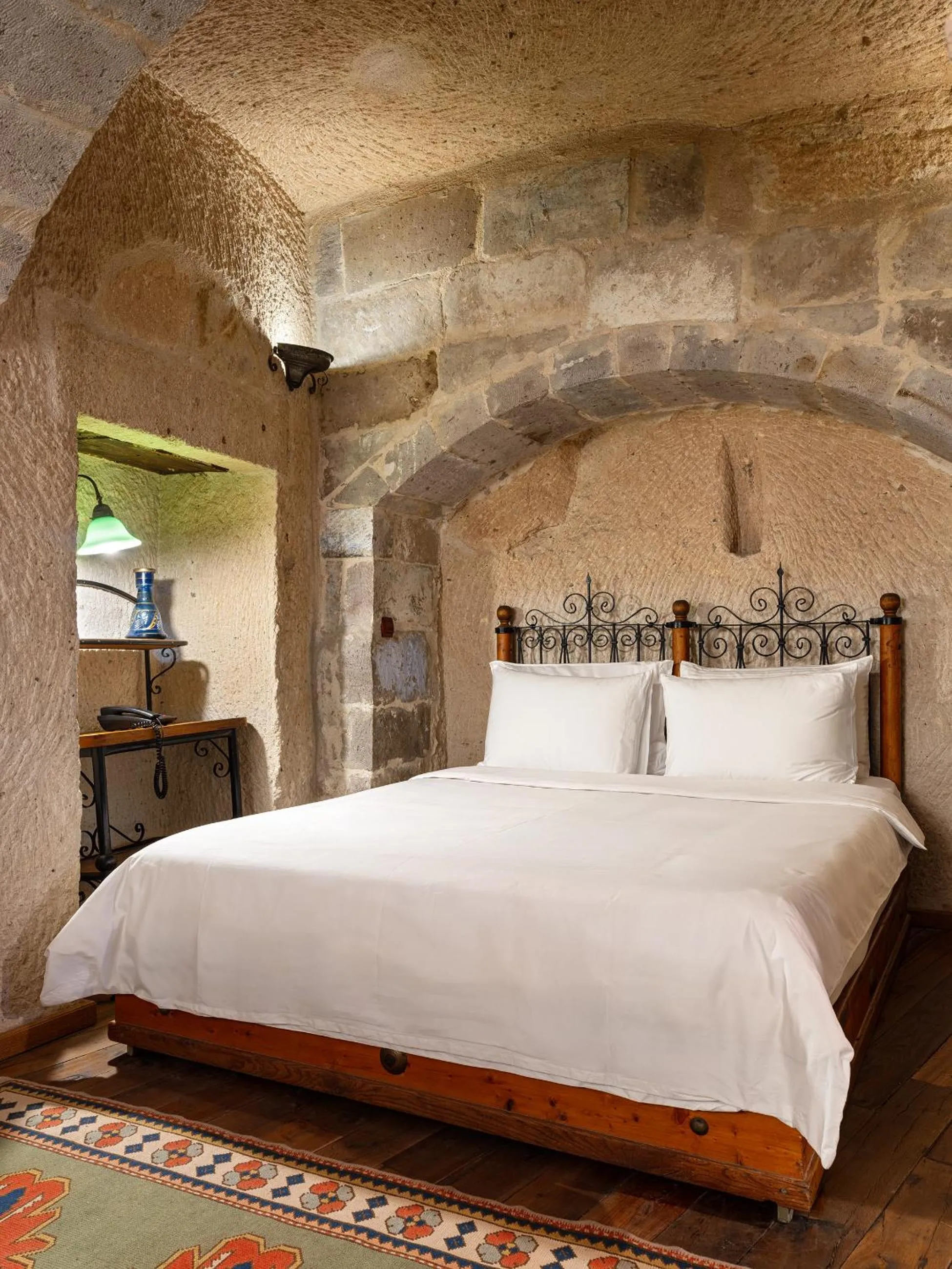 Bed in Kelebek Cave Hotel